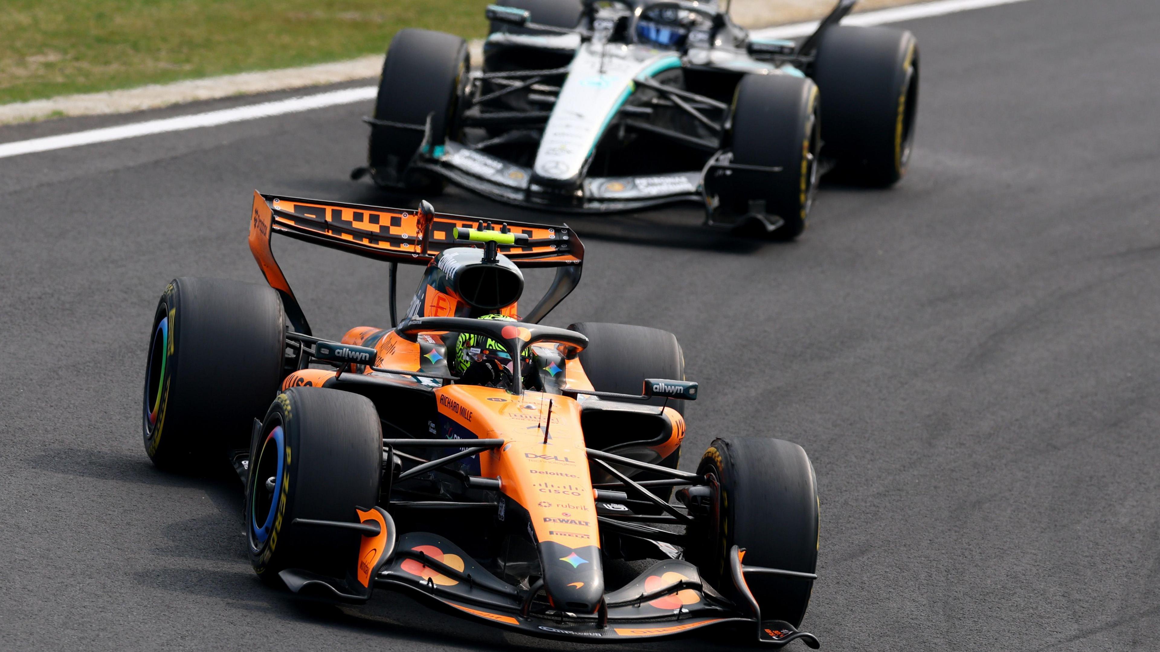McLaren's Oscar Piastri with Mercedes' George Russell just behind during the Japanese Grand Prix