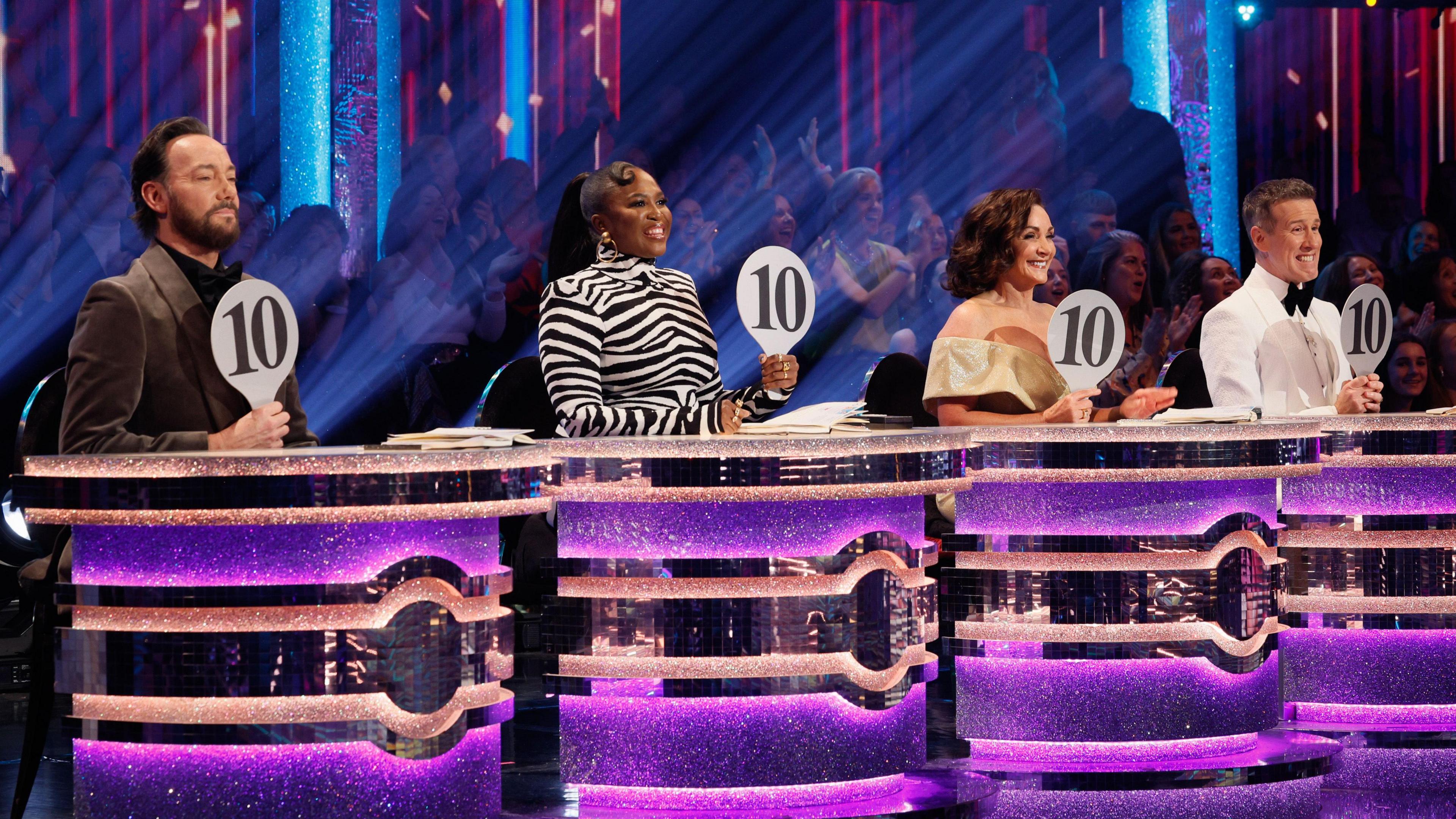 Craig Revel Horwood with a 10 paddle, Motsi Mabuse with a 10 paddle, Shirley Ballas with a 10 paddle and Anton Du Beke with a 10 paddle.