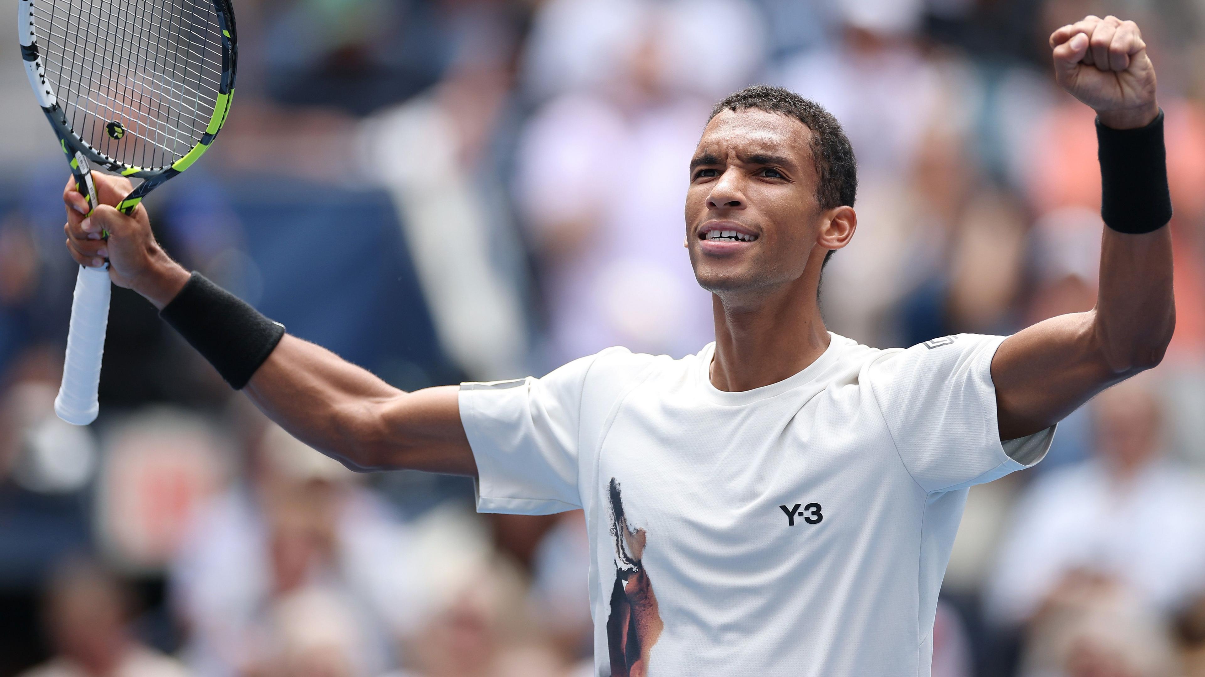 Felix Auger-Aliassime celebrates