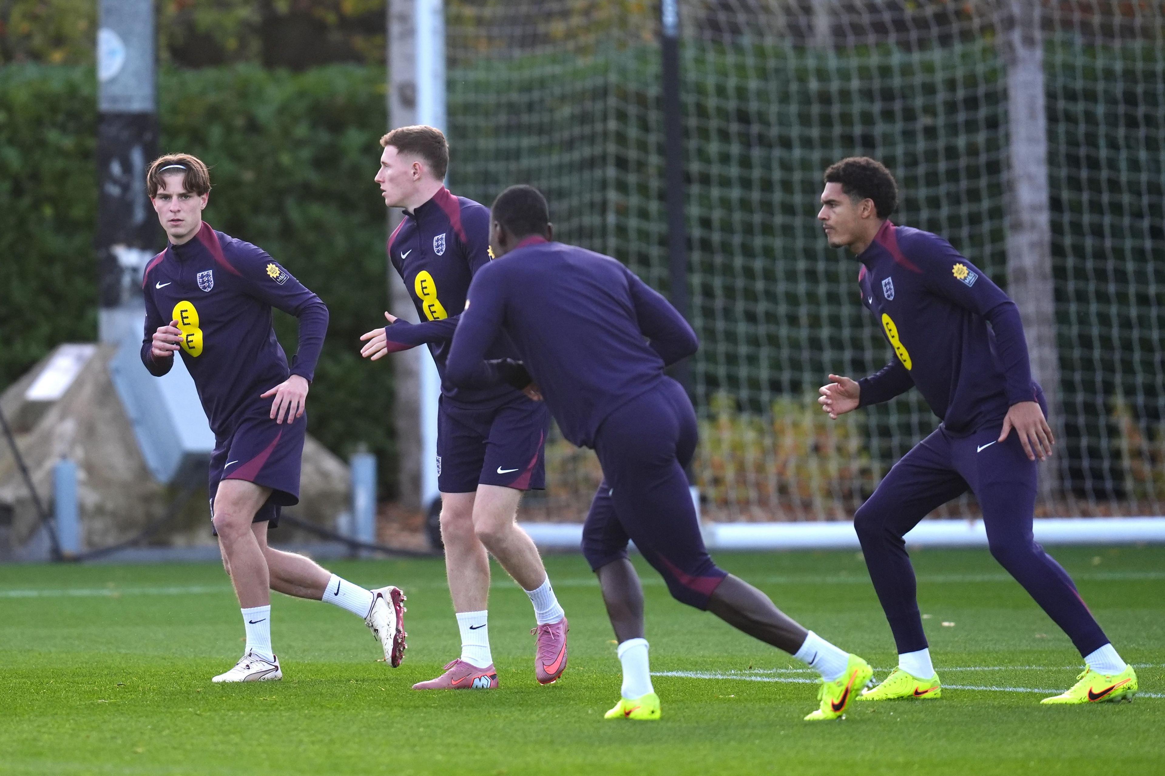 Alex Scott (left) and England team-mates during a training session at the Tottenham Hotspur Training Ground, London.