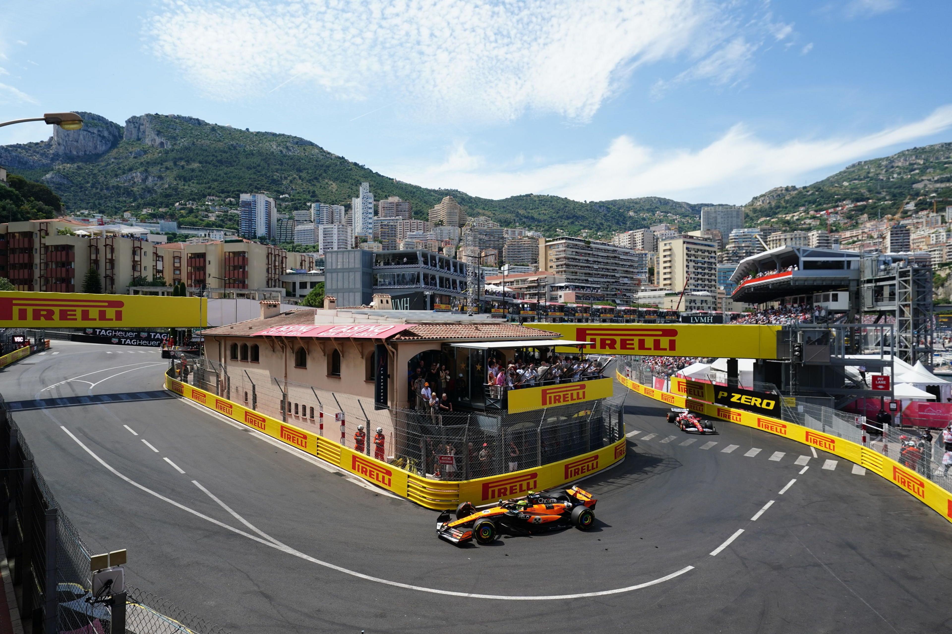 McLaren's Lando Norris leads Charles Leclerc through La Rascasse