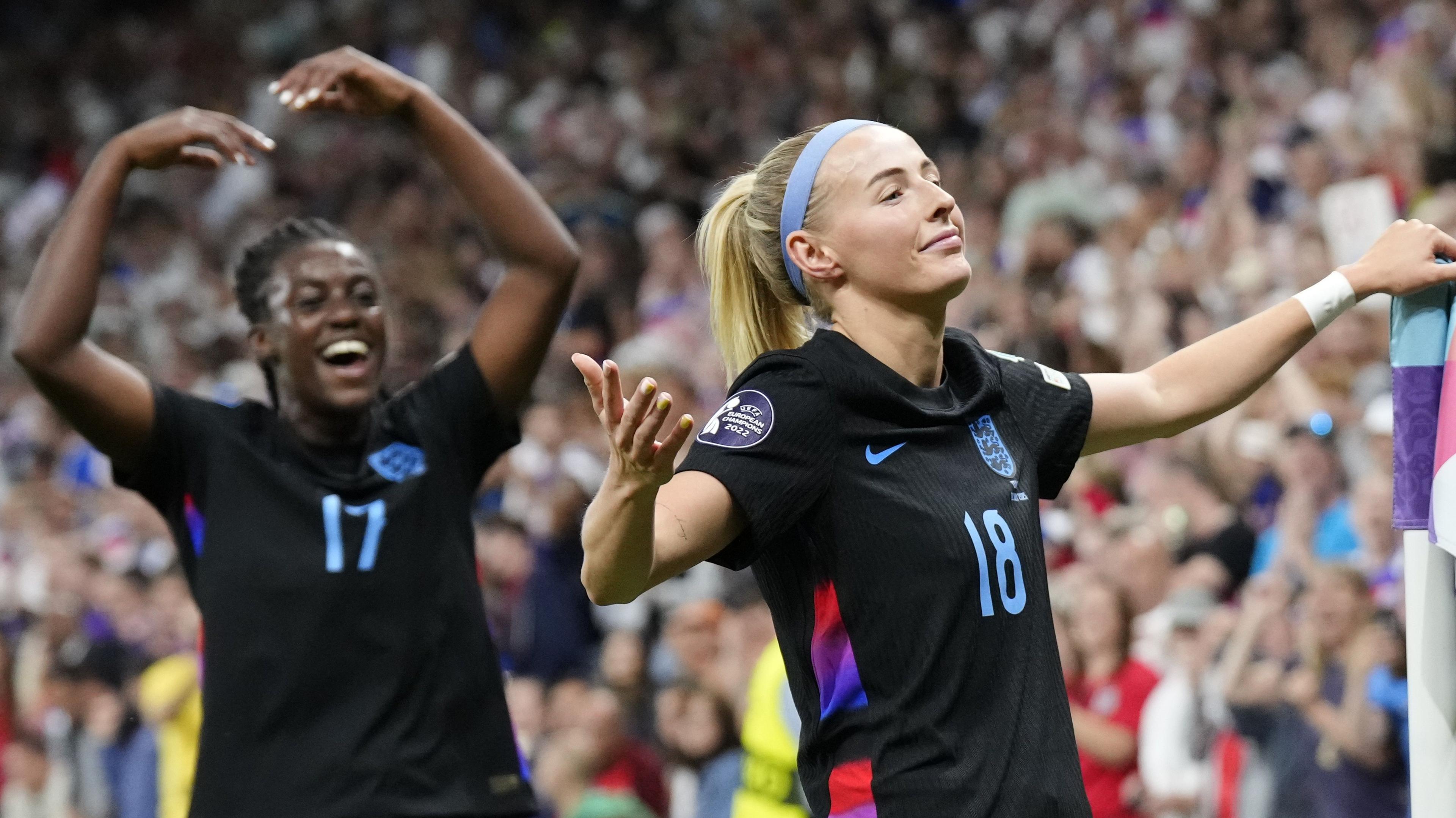 Chloe Kelly and Michelle Agyemang celebrate after Kelly scores for England against Italy