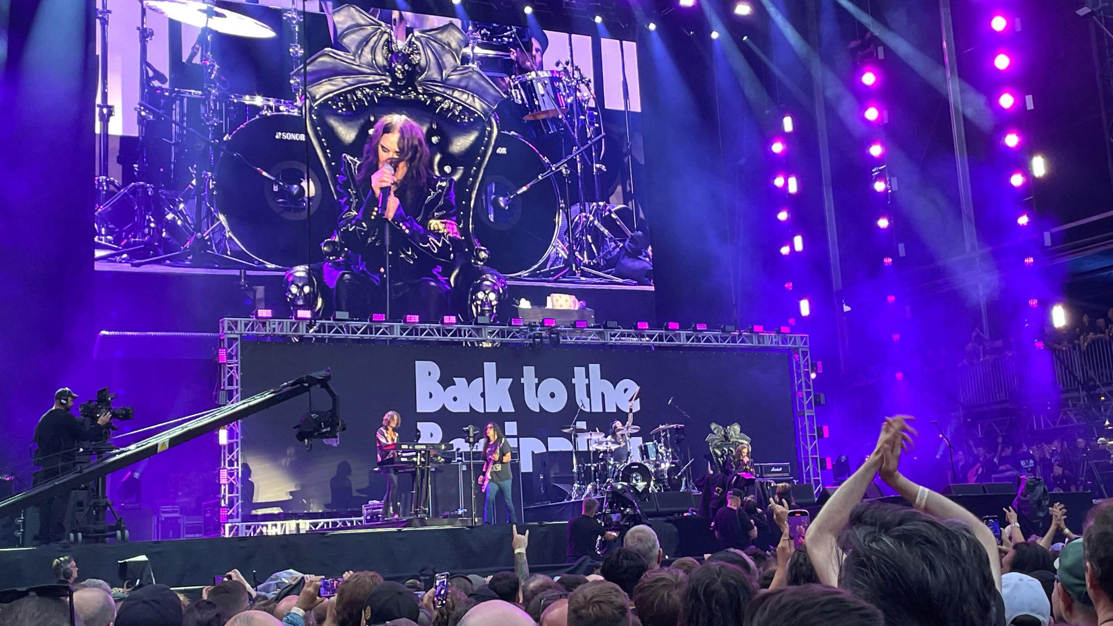 Ozzy Osbourne is seen on a screen as he performs at the Black Sabbath's farewell show titled Back to the Beginning at Villa Park in Birmingham.