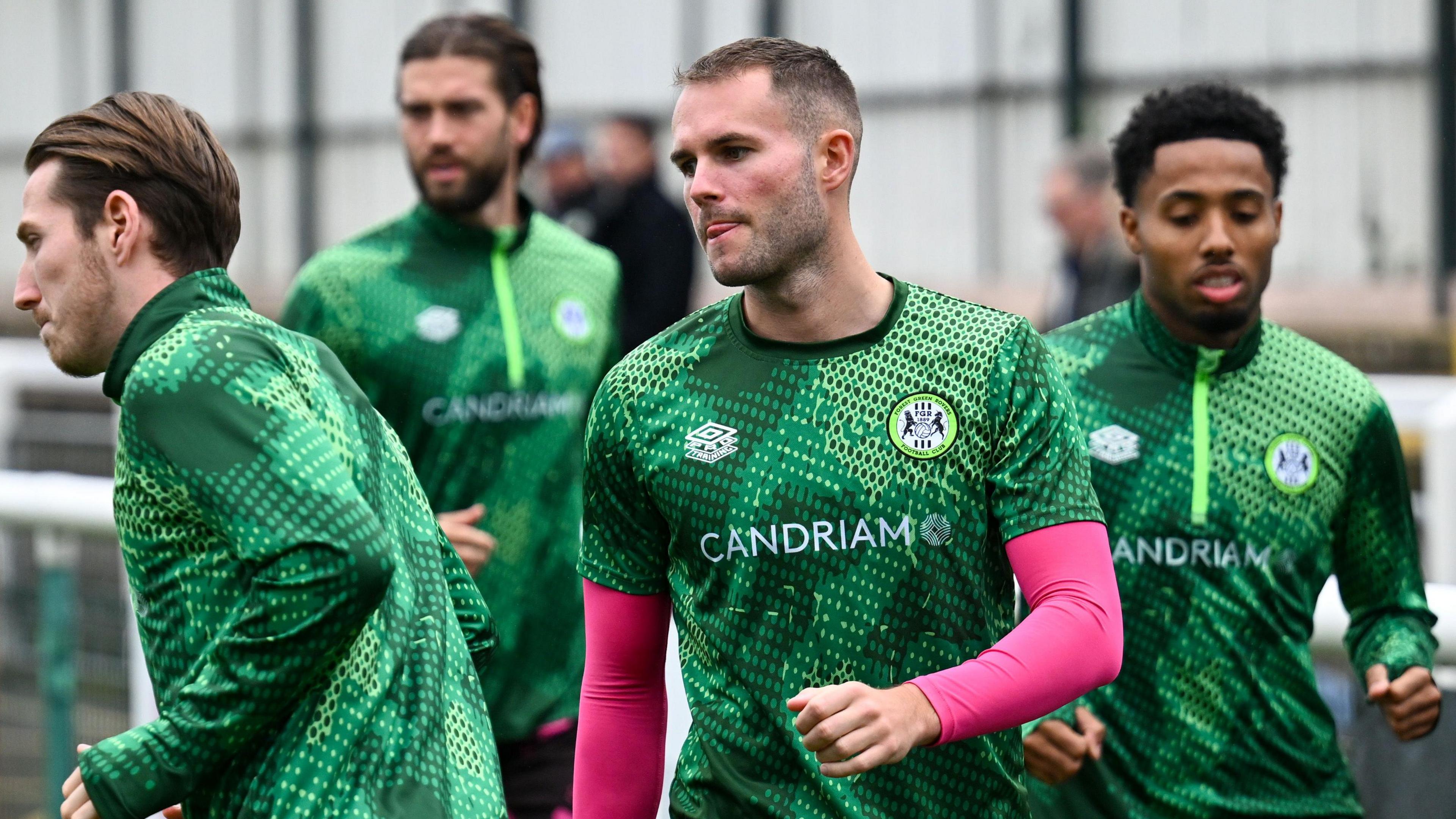 Forest Green Rovers players warm up