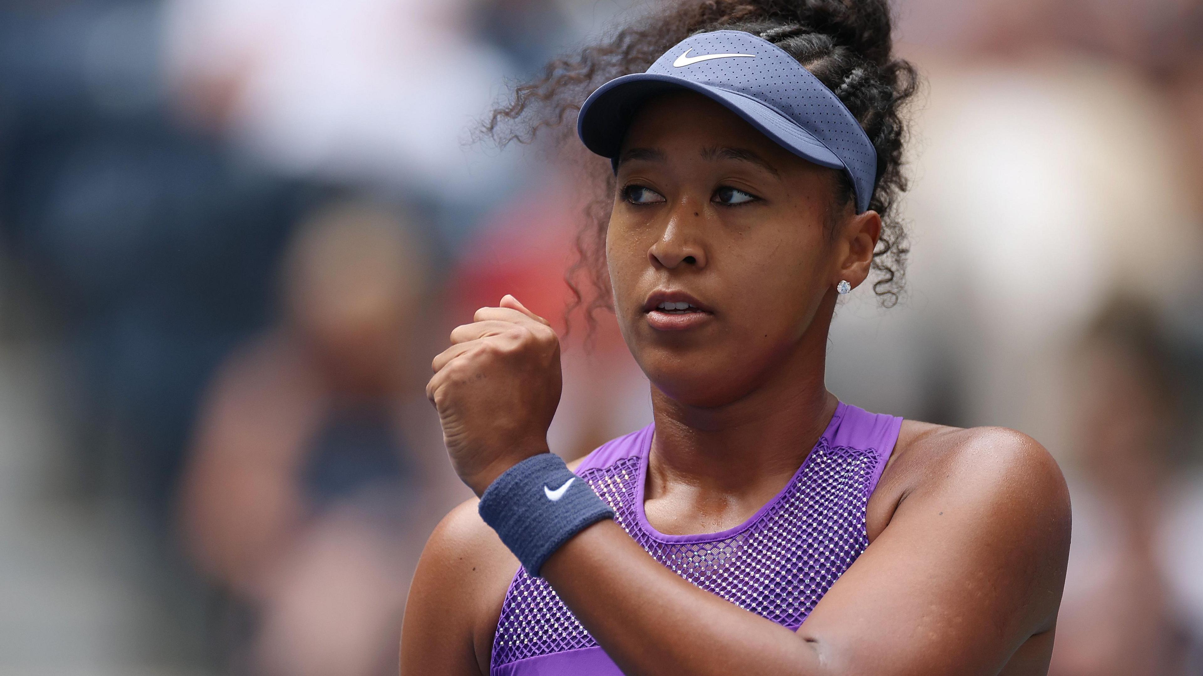 Naomi Osaka celebrates