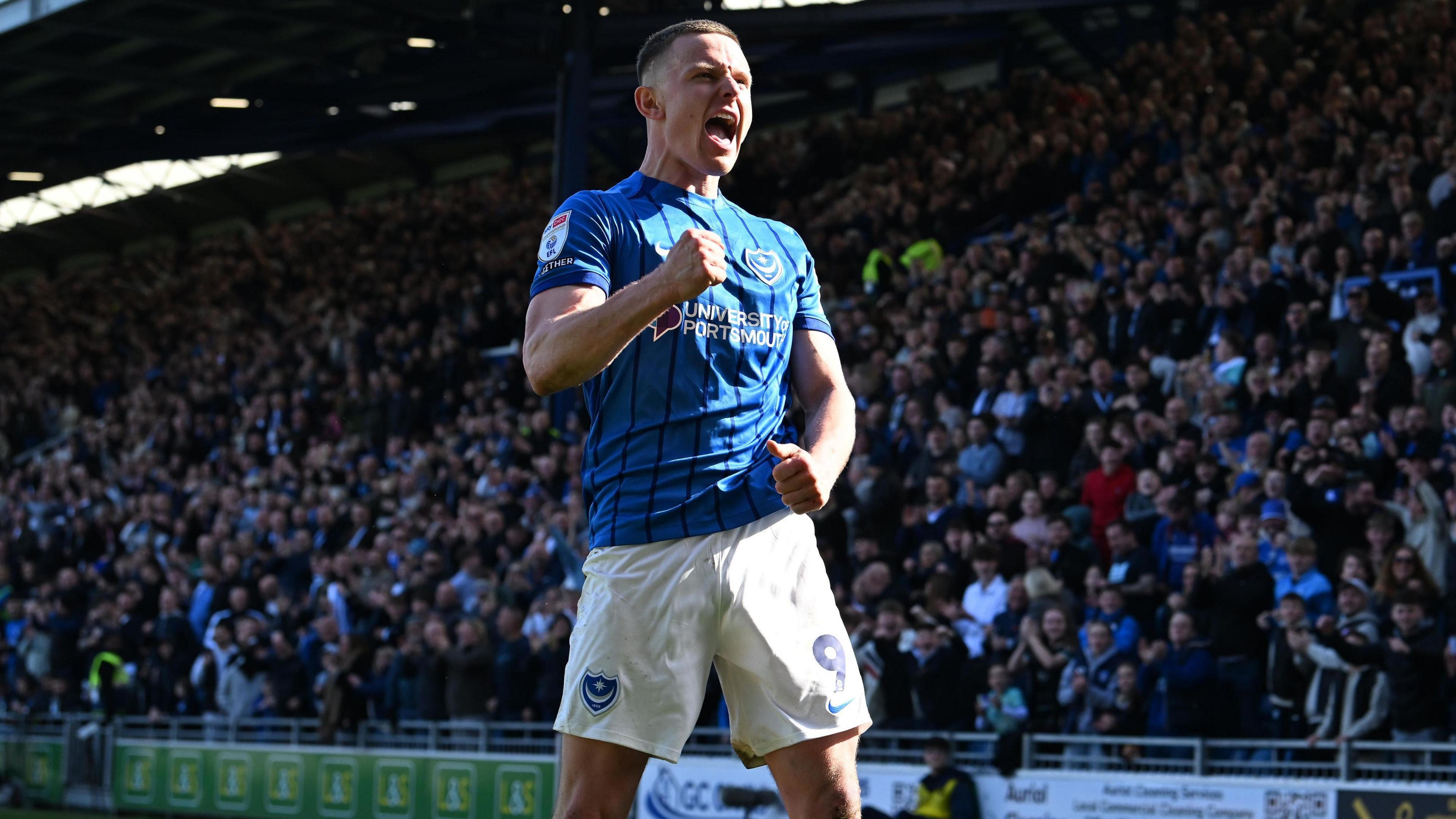 Colby Bishop celebrates scoring against Leeds United at Fratton Park