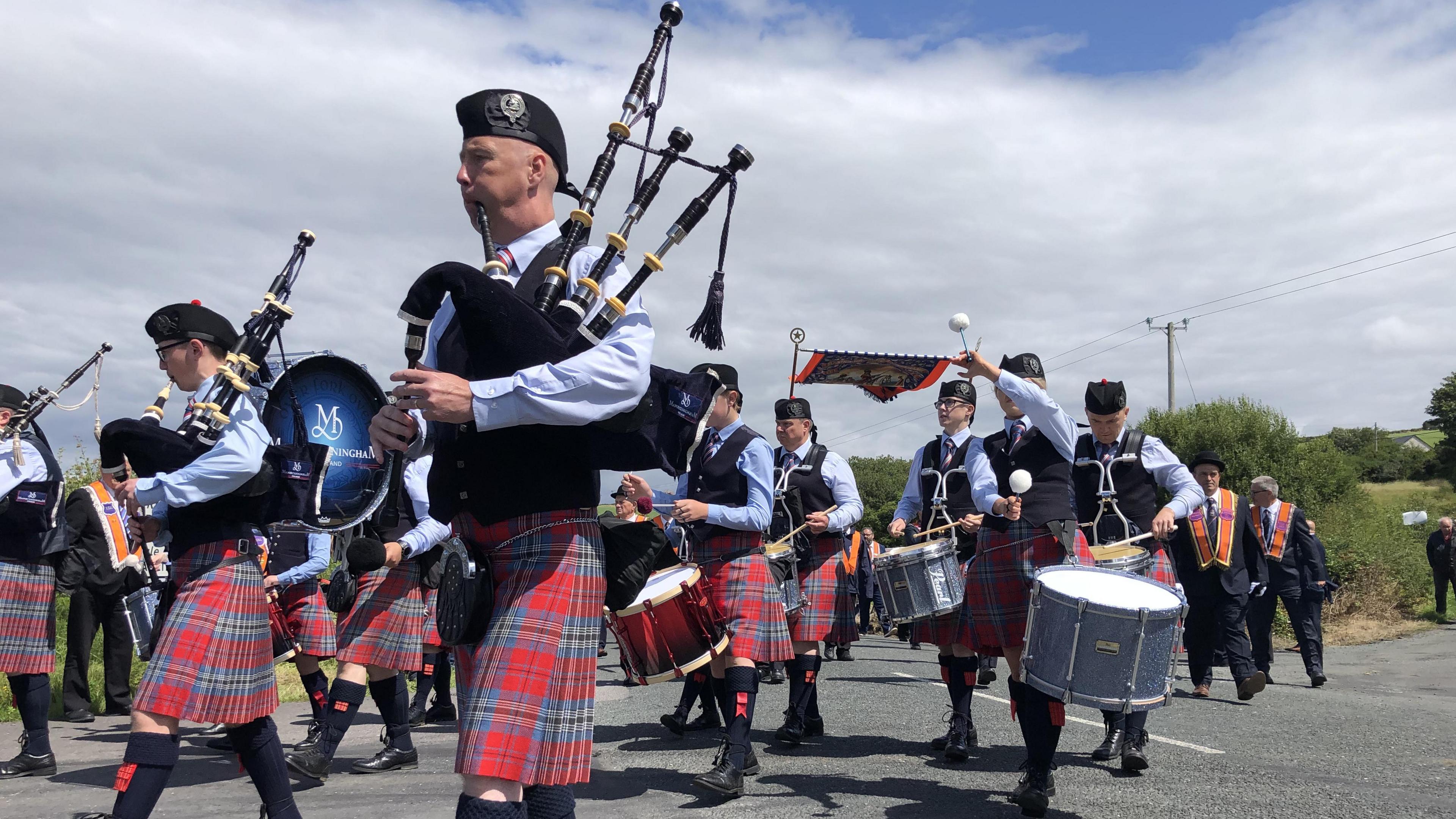 Bagpipe player and band at Rossnowlagh