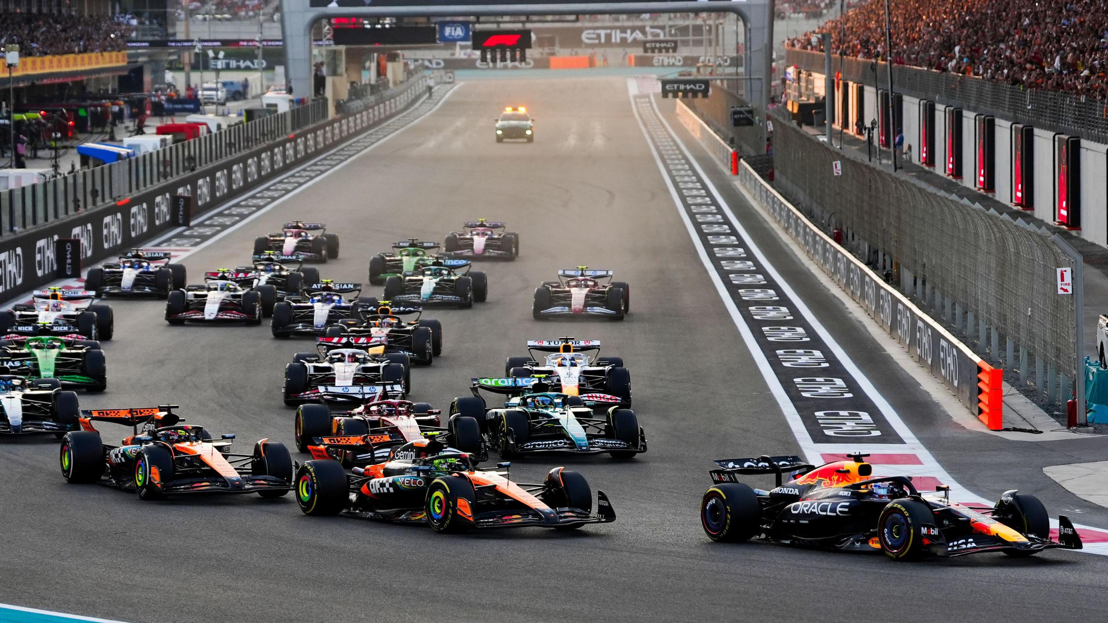 A series of F1 cars on the race track