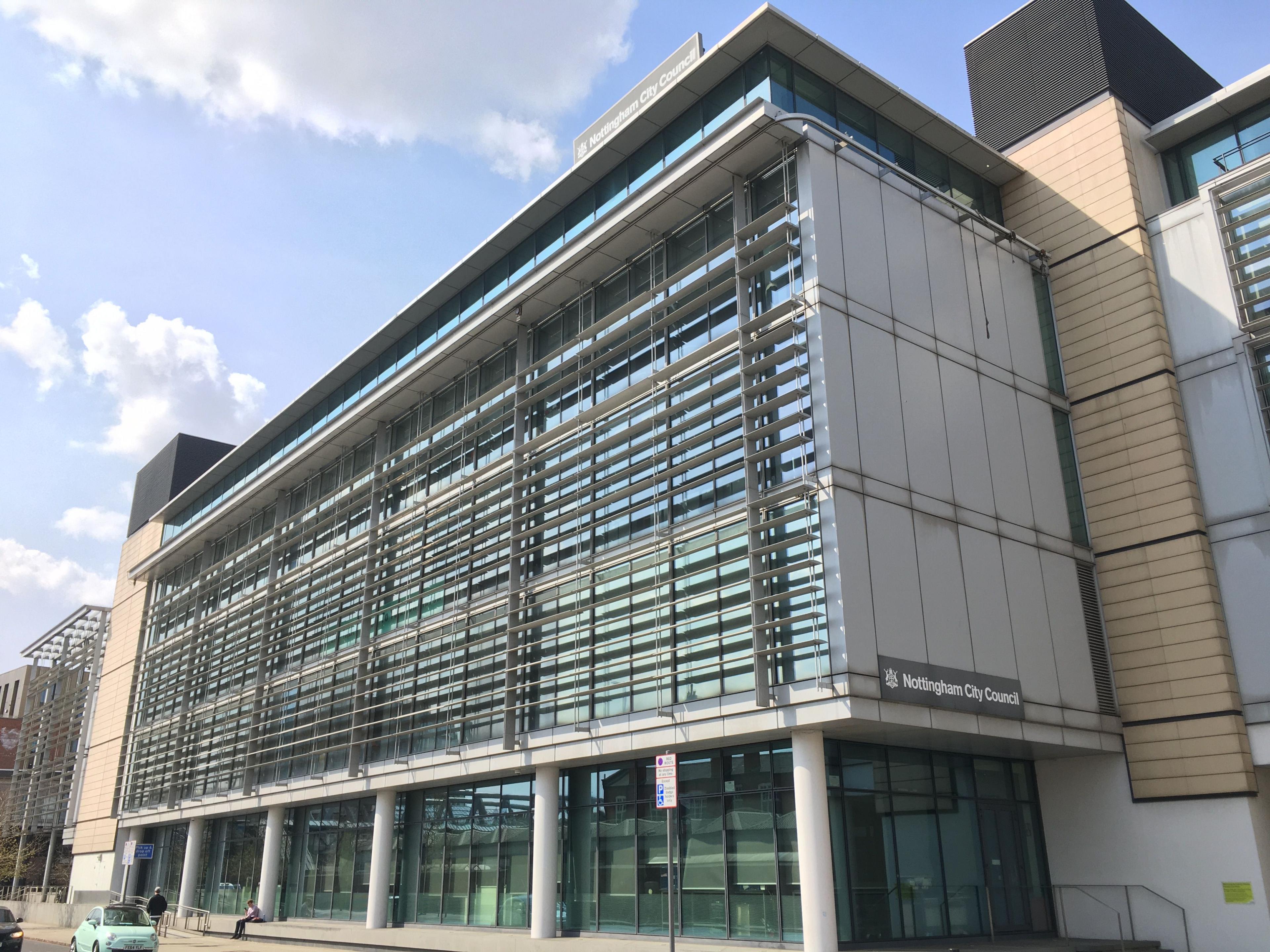 A large building - loxley house. There is a sign on the front saying nottingham city council and the building has large windows with grey and beige panelling.