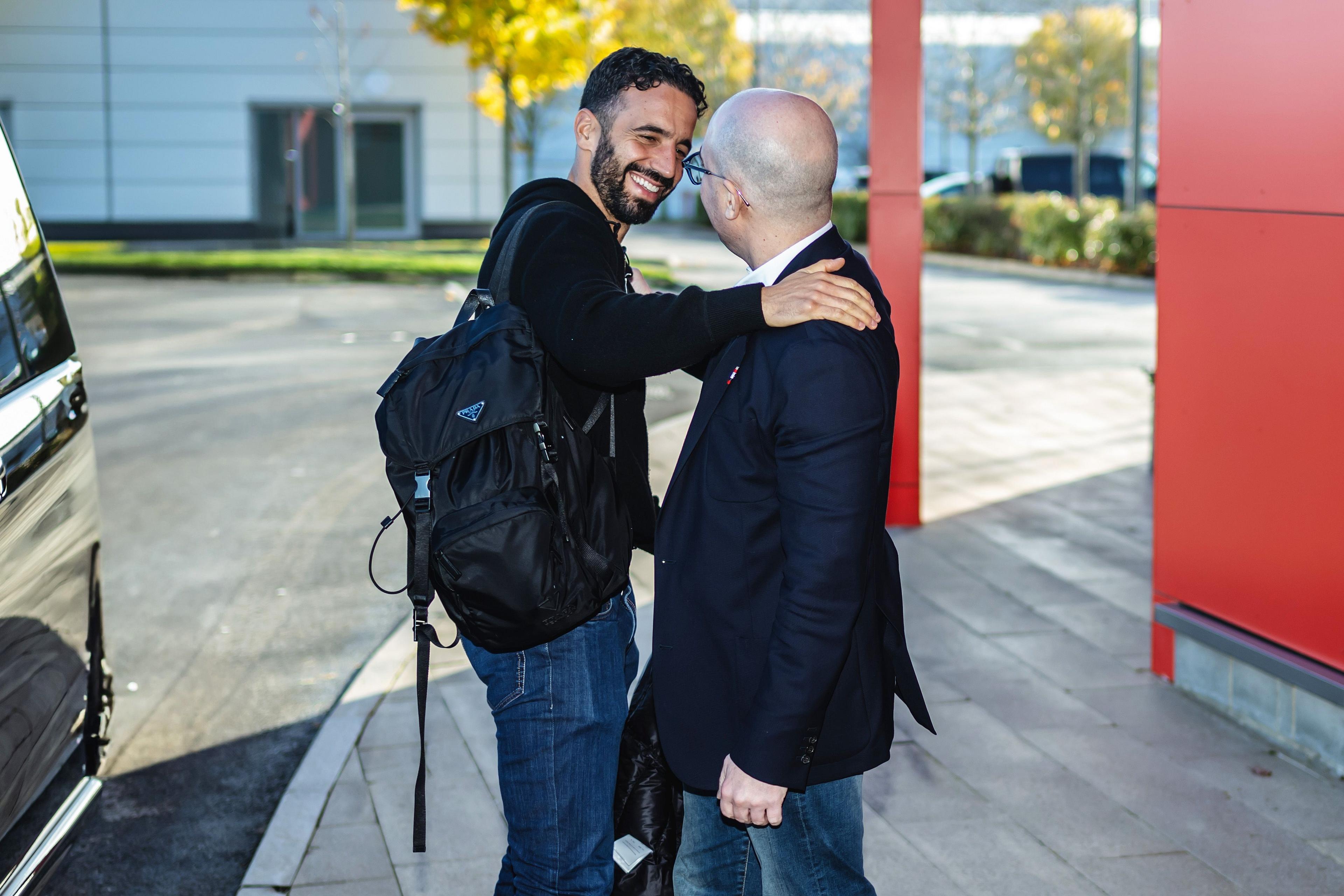 Ruben Amorim and Omar Barrada embrace at Manchester United's training ground