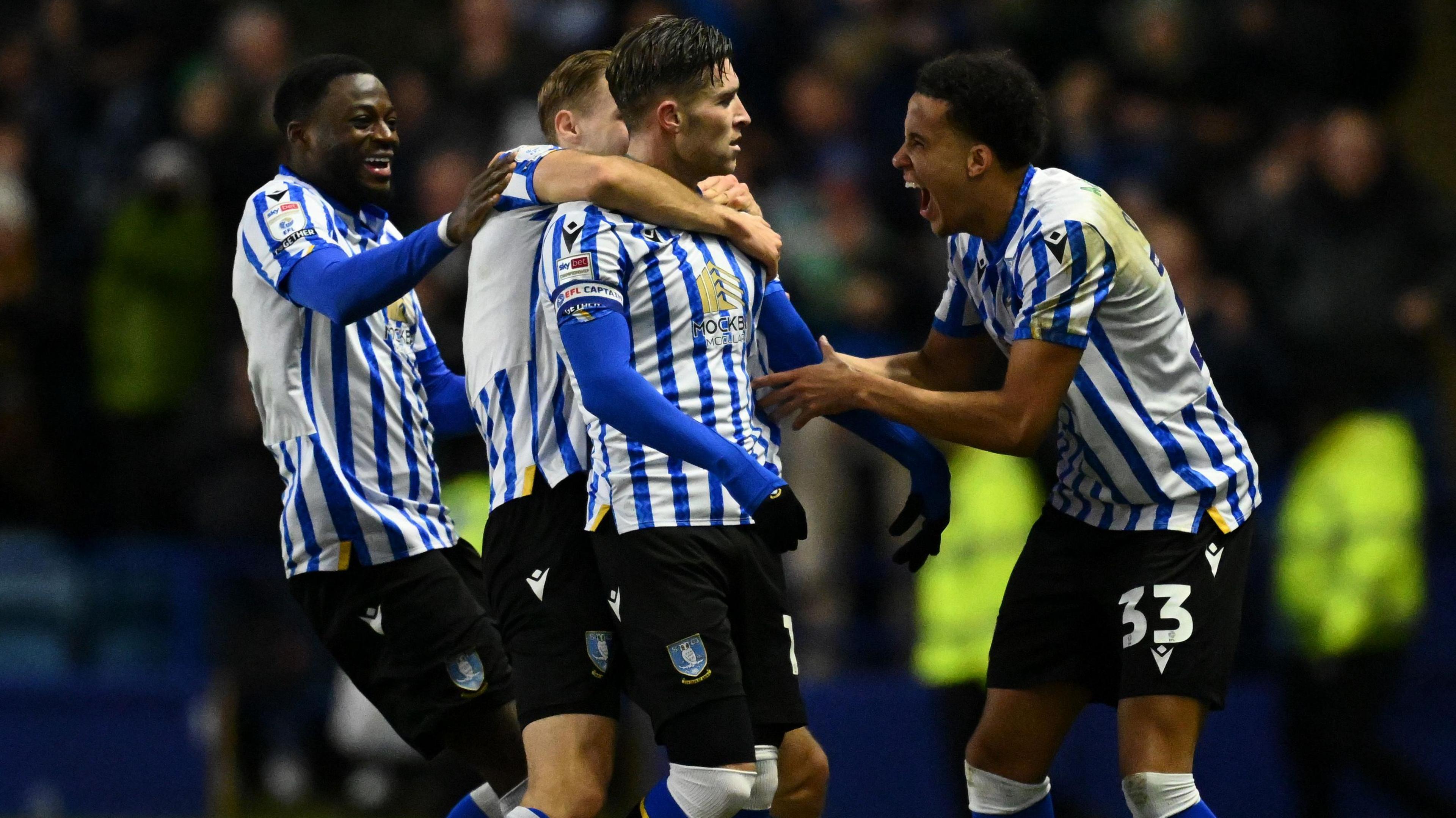 Josh Windass celebrates scoring