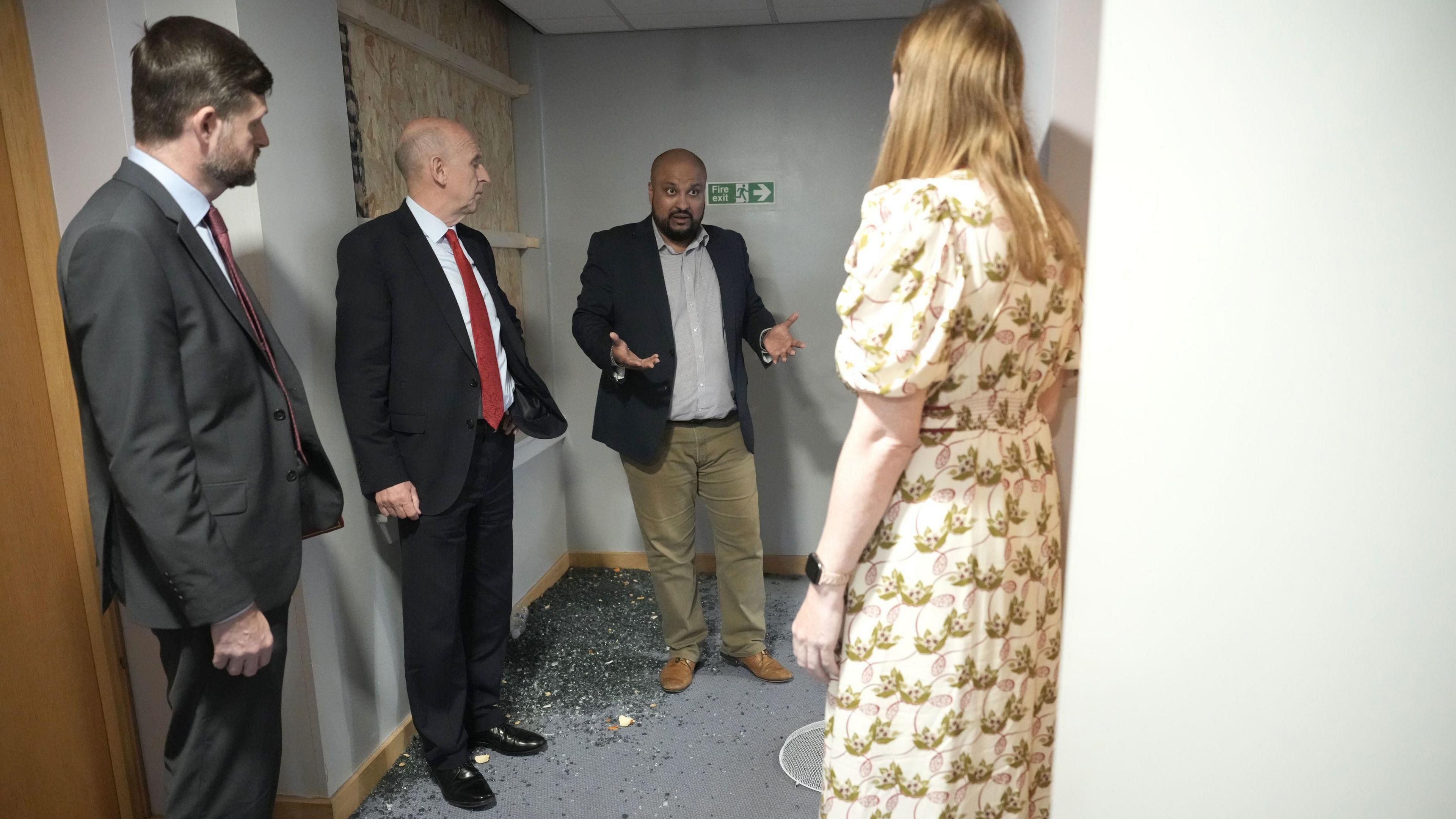 Deputy Prime Minister Angela Rayner, Minister of State at the Ministry of Housing, Communities and Local Government Jim McMahon and Secretary of State for Defence John Healey visit a Holiday Inn Express where cleanup efforts are underway