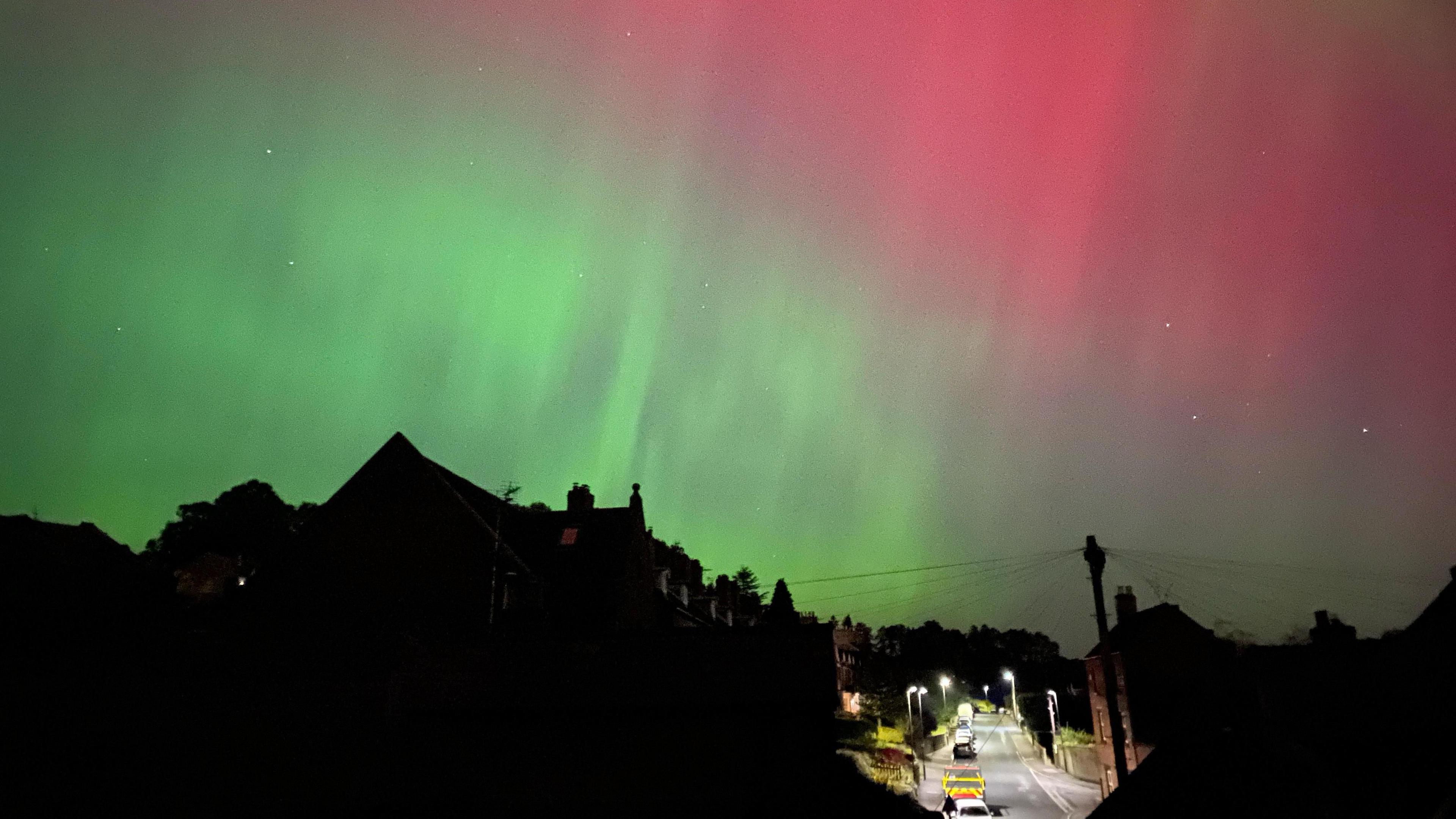 Green and pink lights over Ashbourne in Derbyshire