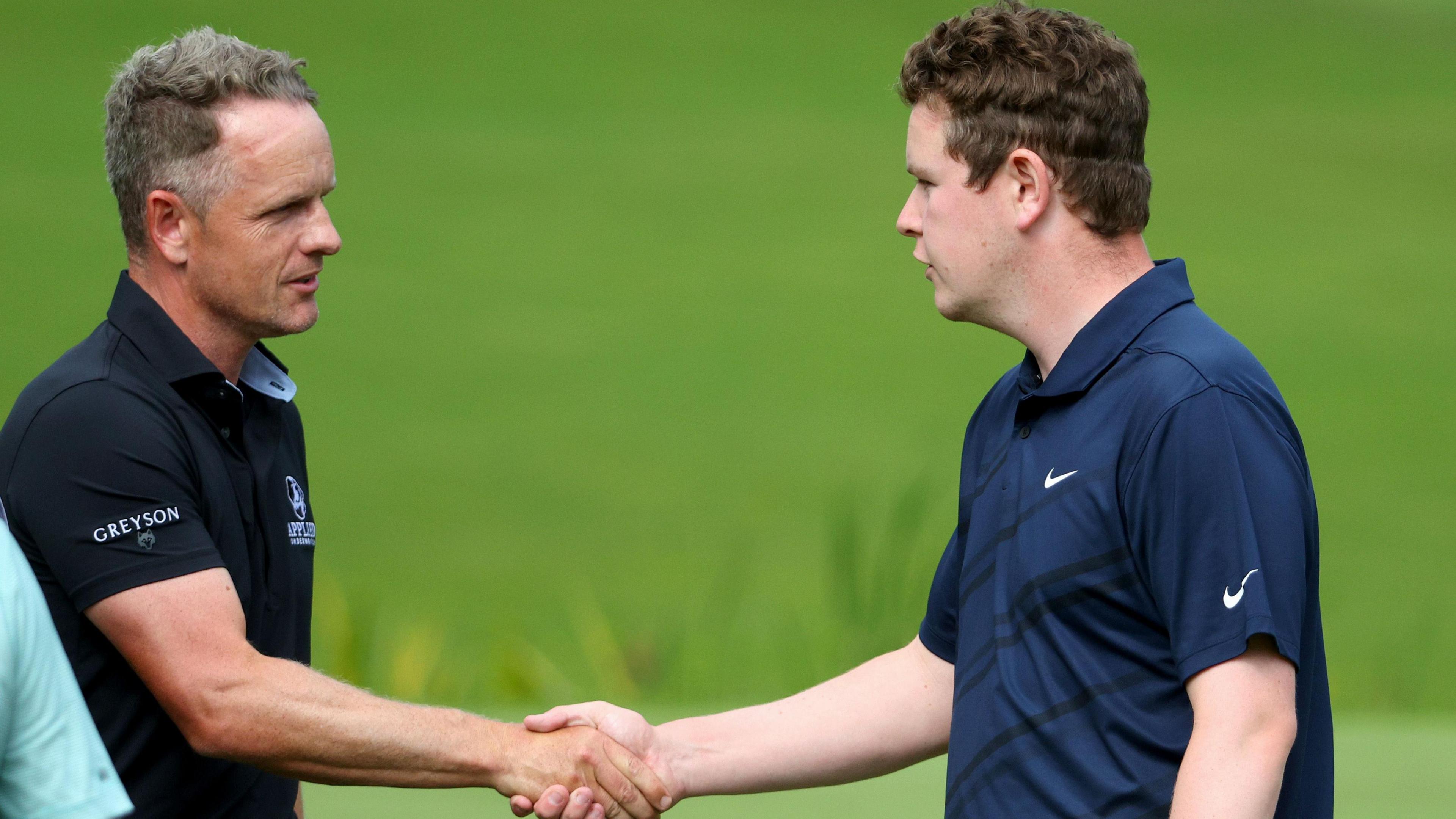 Luke Donald and Robert Macintyre shaking hands at Wentworth in 2022
