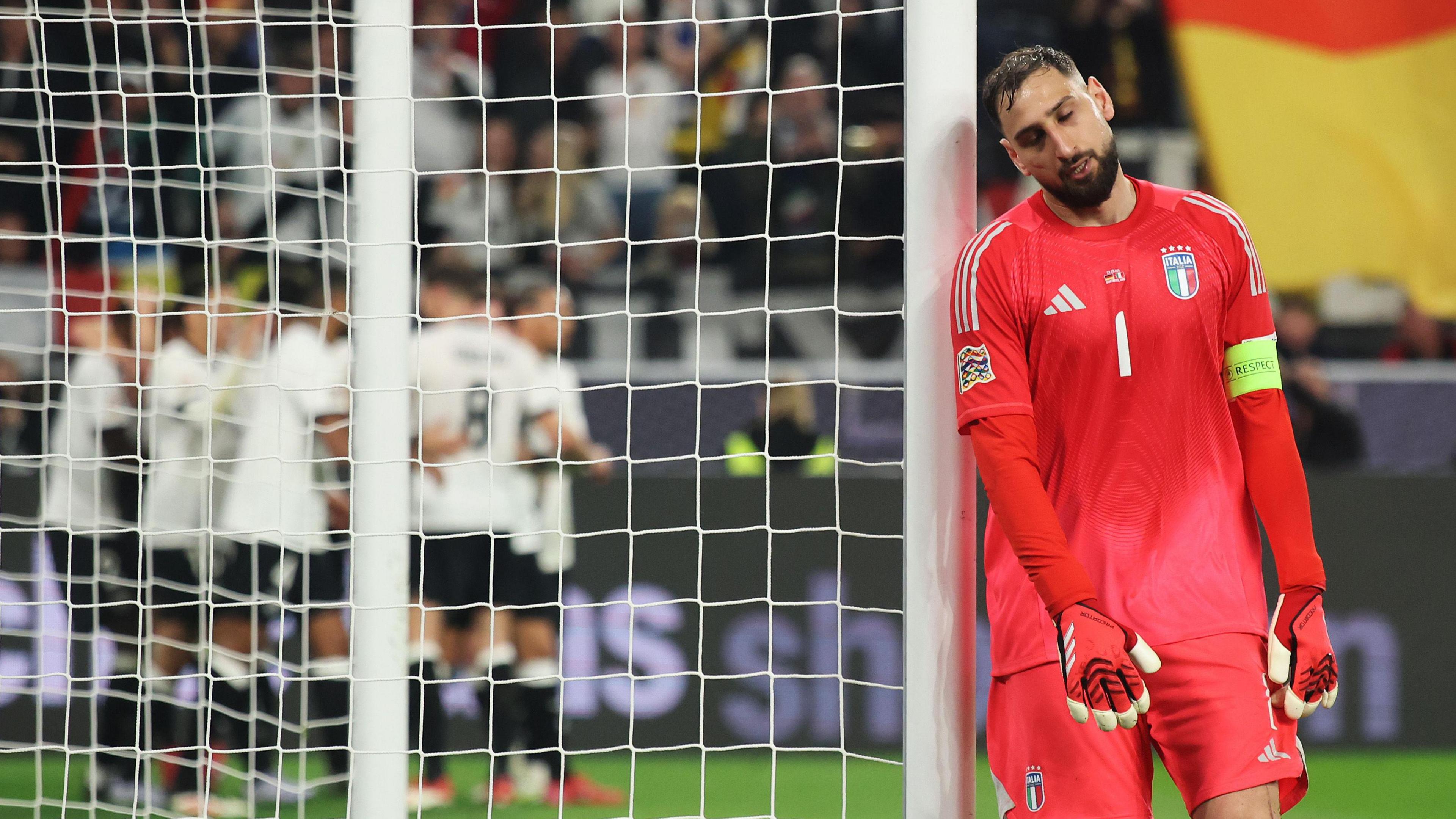 Italy's Gianluigi Donnarumma looks dejected after conceding against Germany in the Nations League