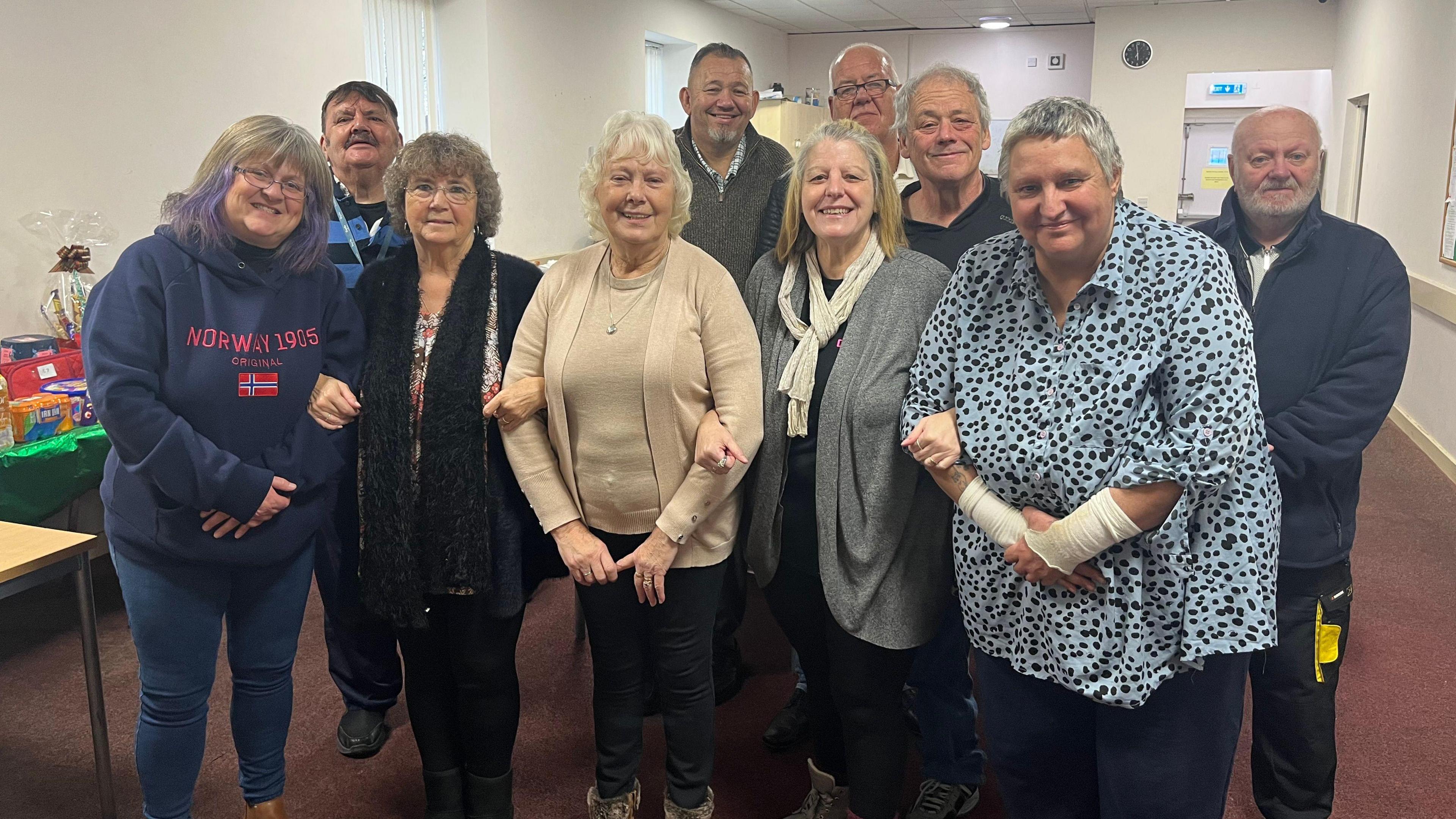 A group picture of some of the club members at the Portsmouth Deaf Club.