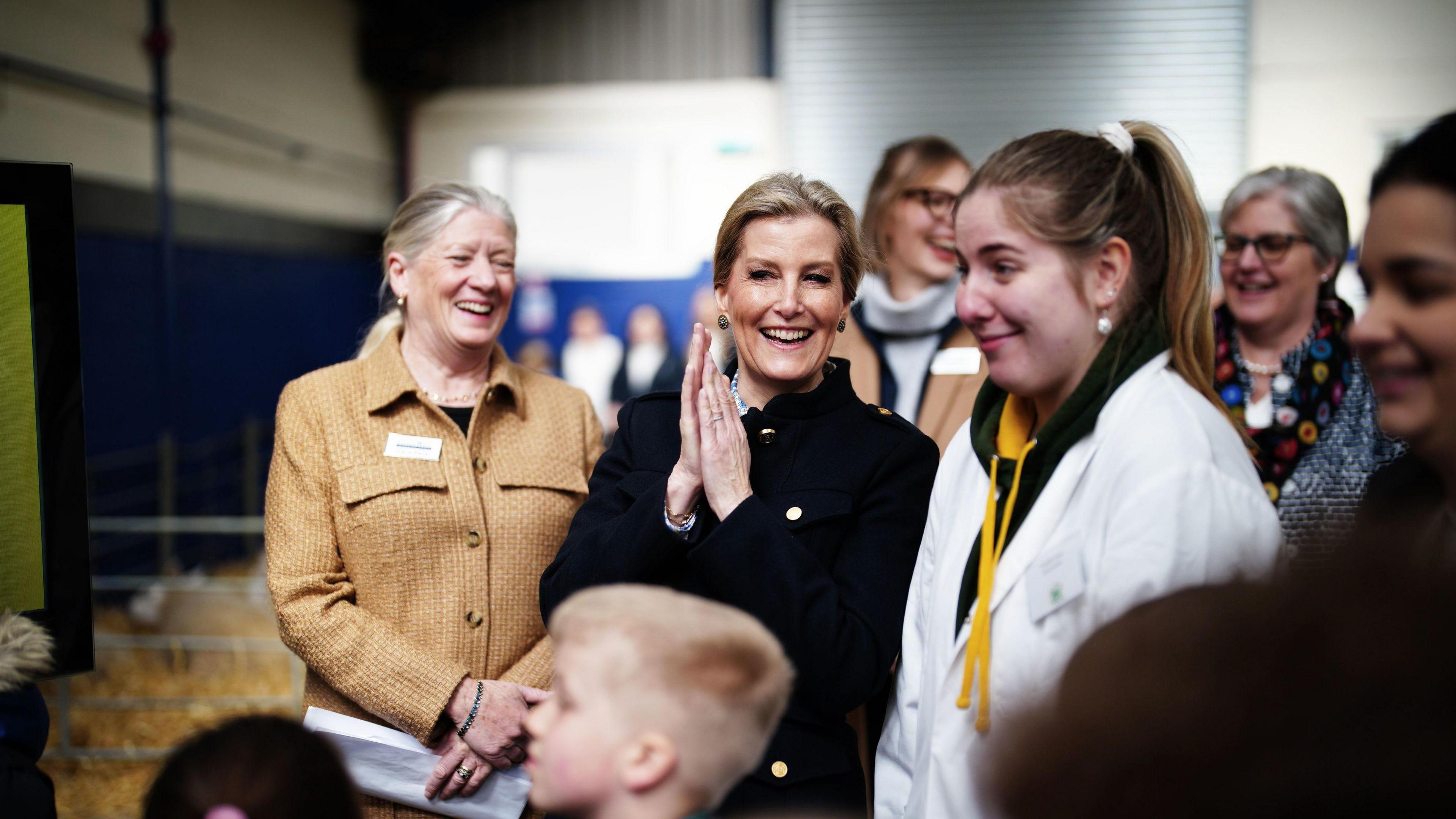 Duchess of Edinburgh clapping her hands