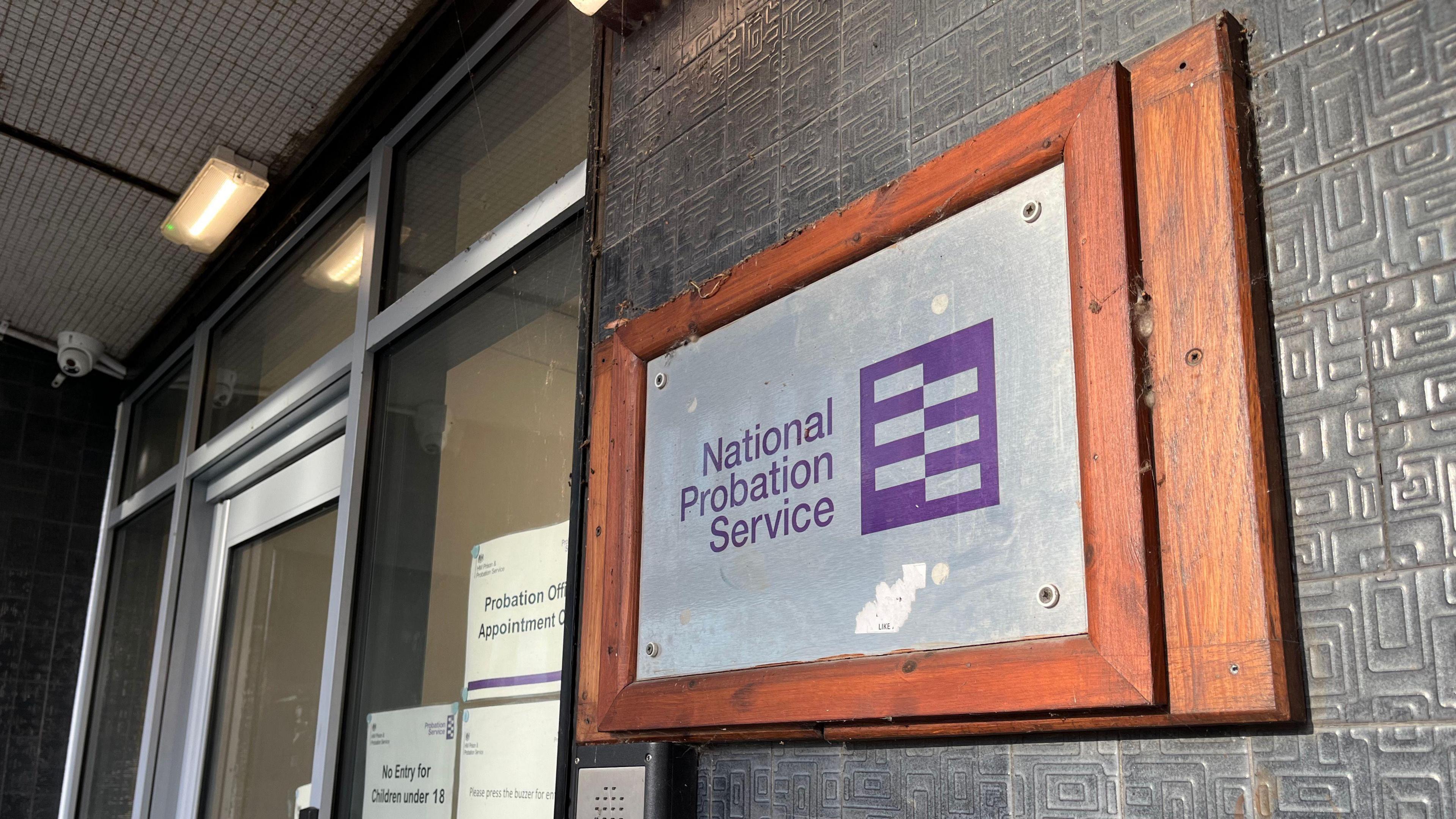 Probation office door with National Probation Service sign