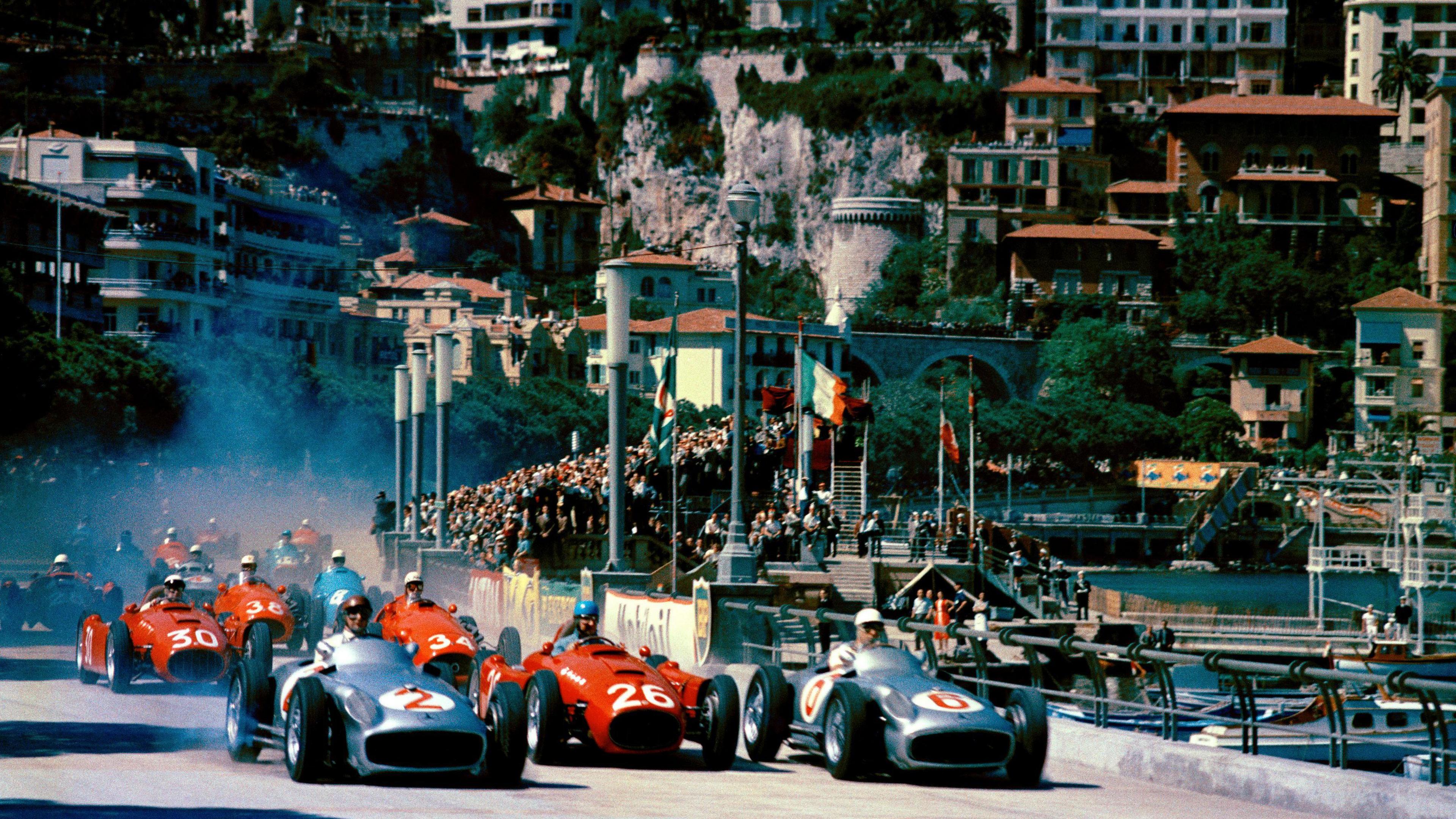 The start of the 1955 race with the Mercedes of Juan Manuel Fangio and Stirling Moss leading the way