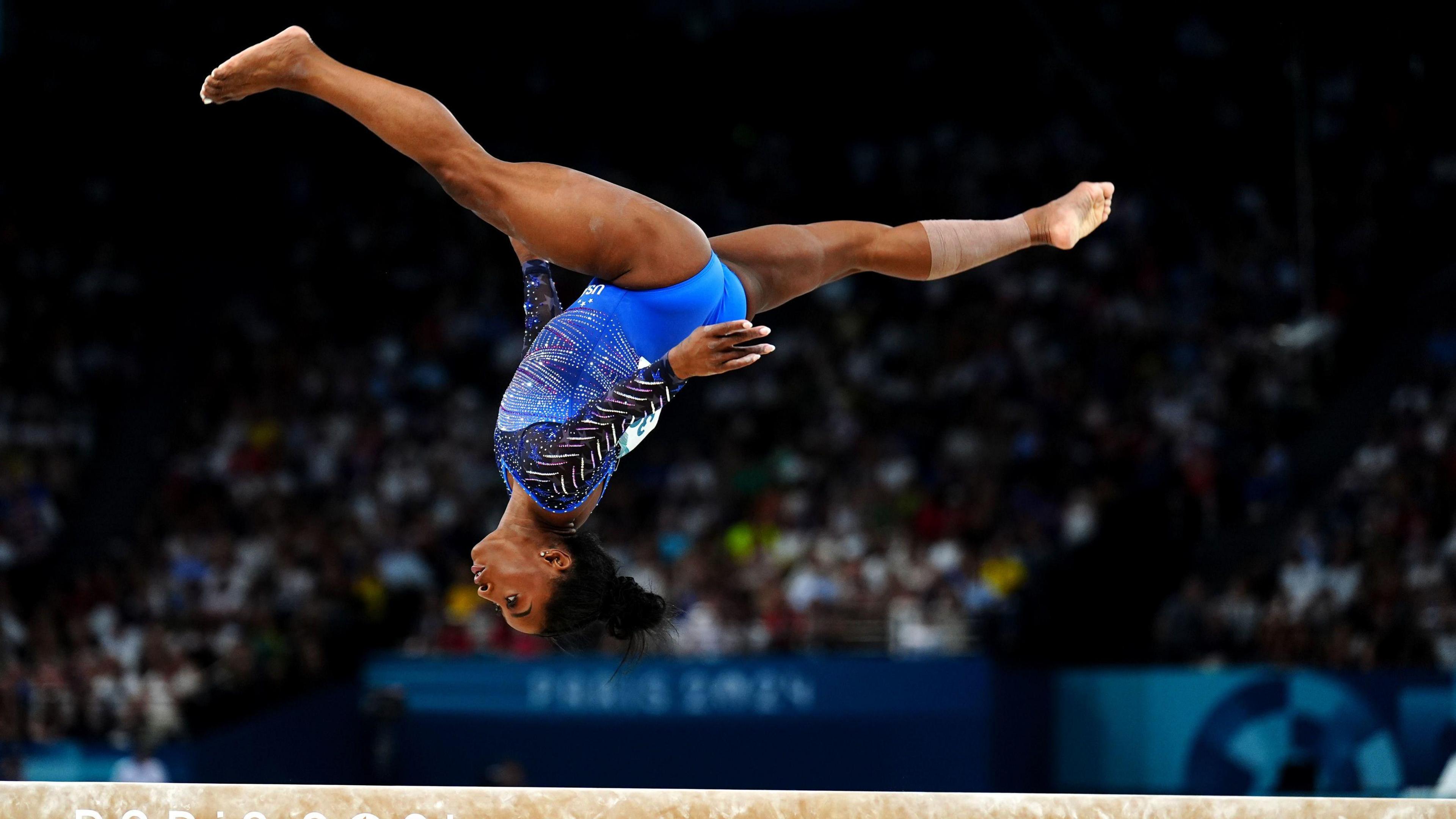Simone biles on balance beam
