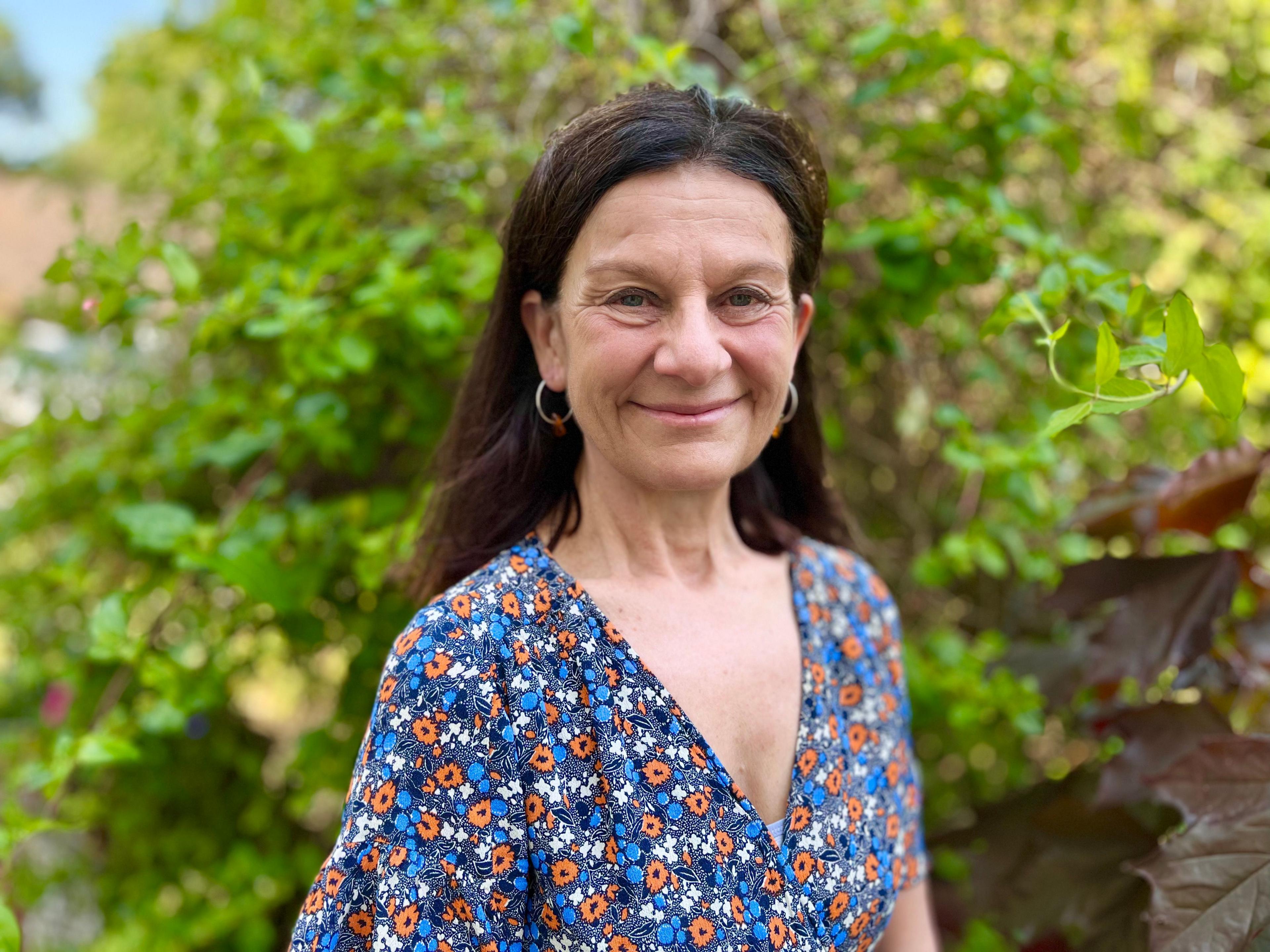 Profile picture of Bridget Smith with foliage in the background