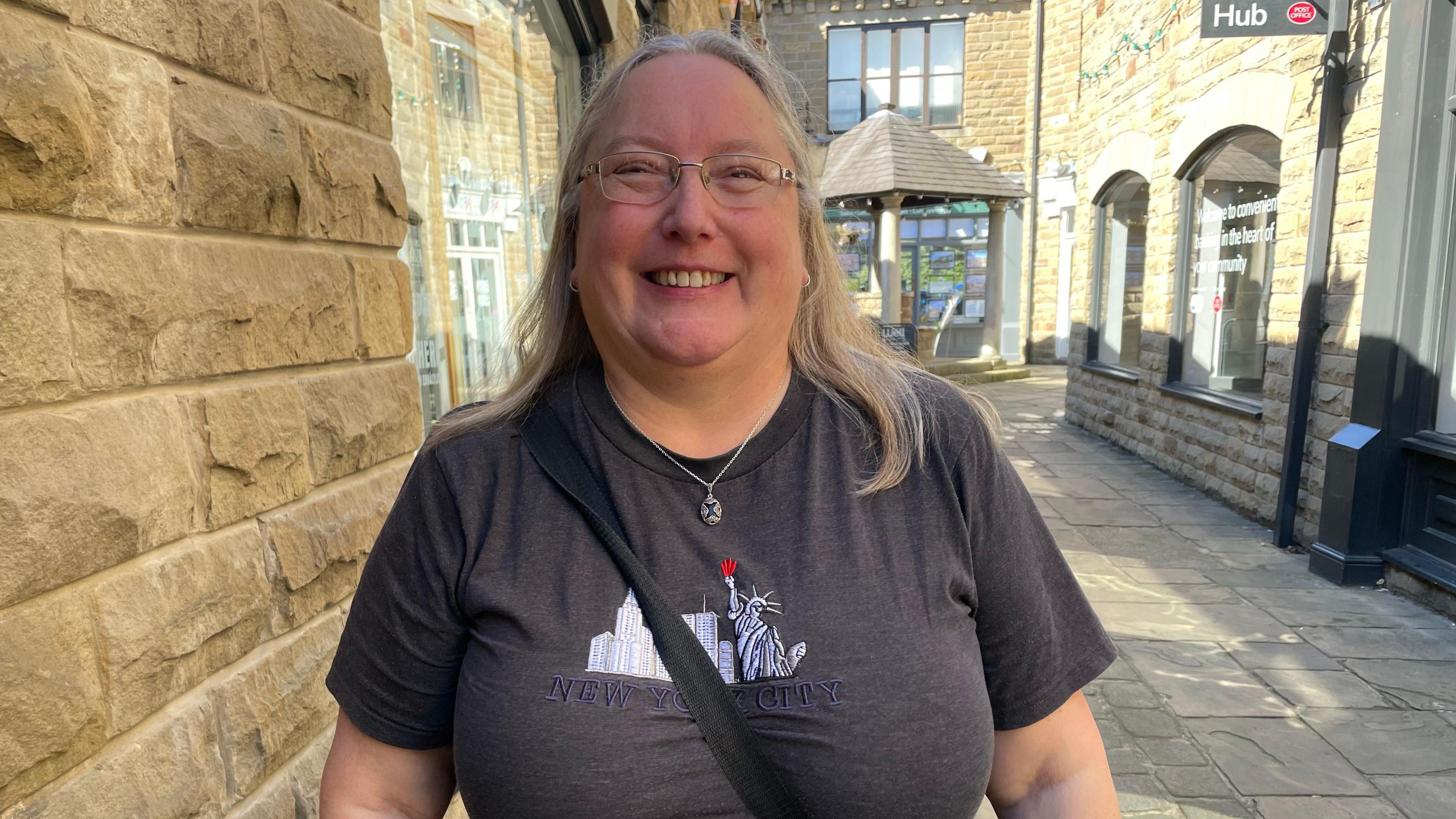 Linda Spendelow, standing outside the banking hub