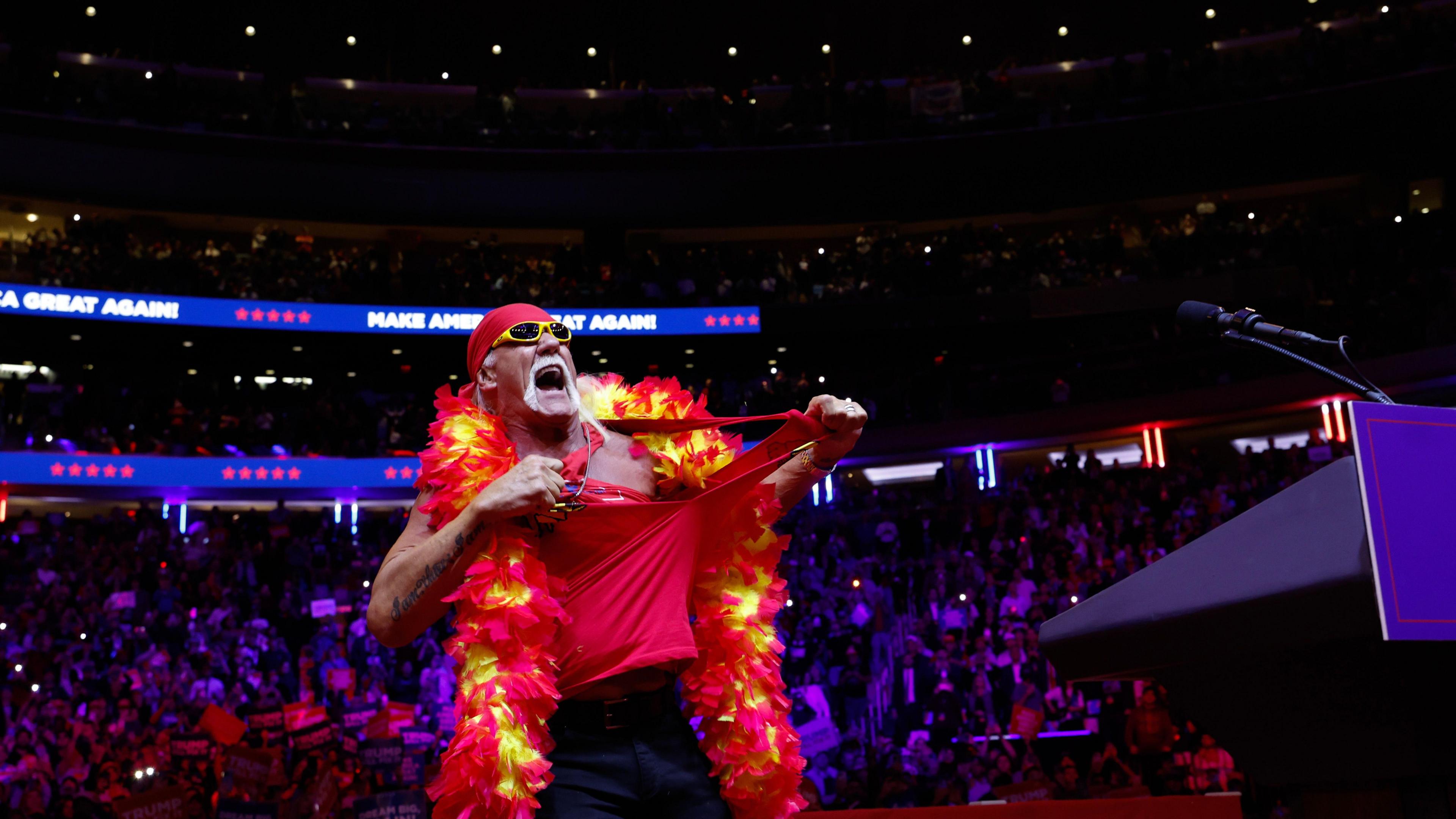 Former wrestler Hulk Hogan rips off his shirt at Trump's campaign rally at Madison Square Garden 