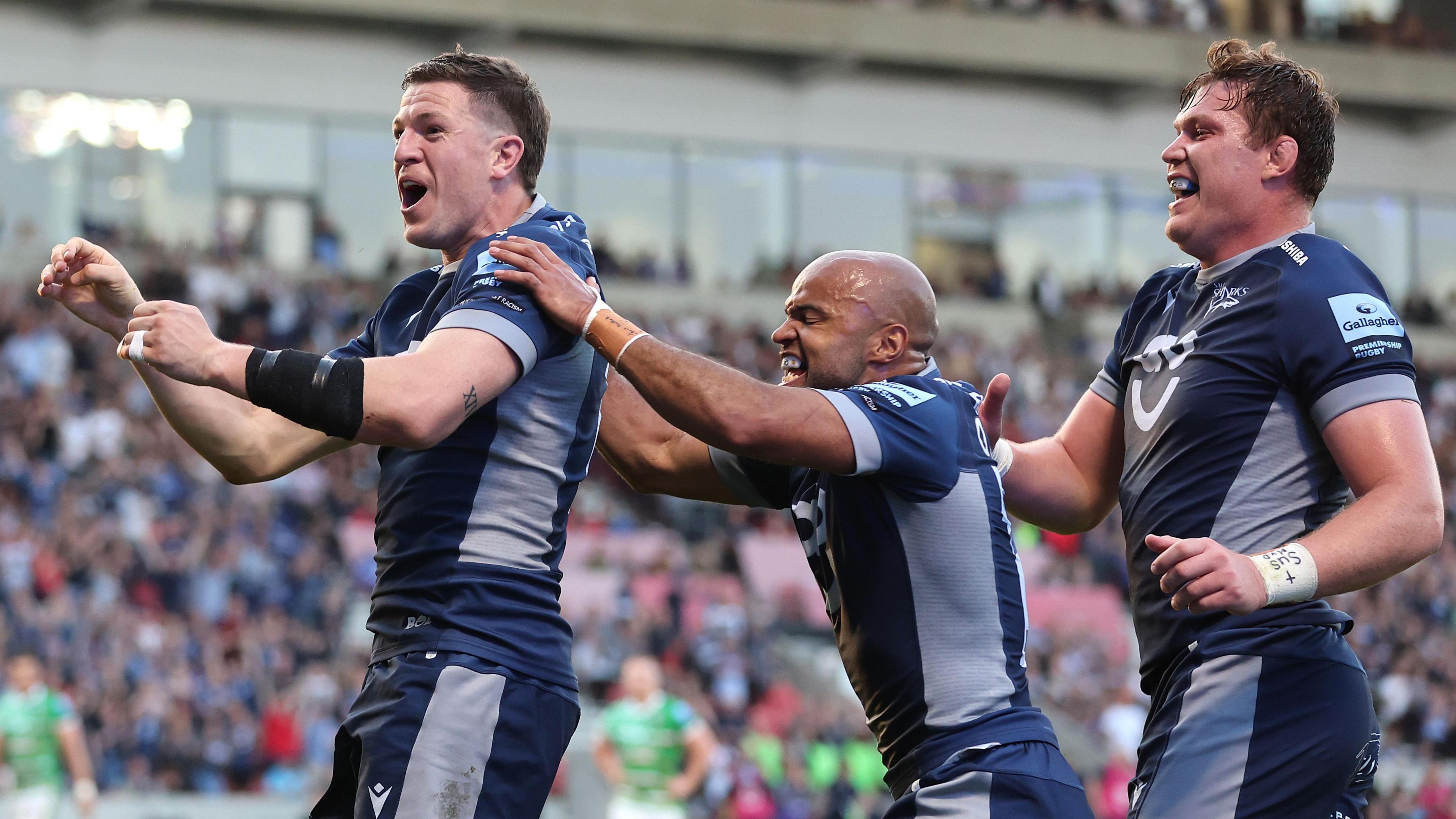 Sale players celebrate after a try 