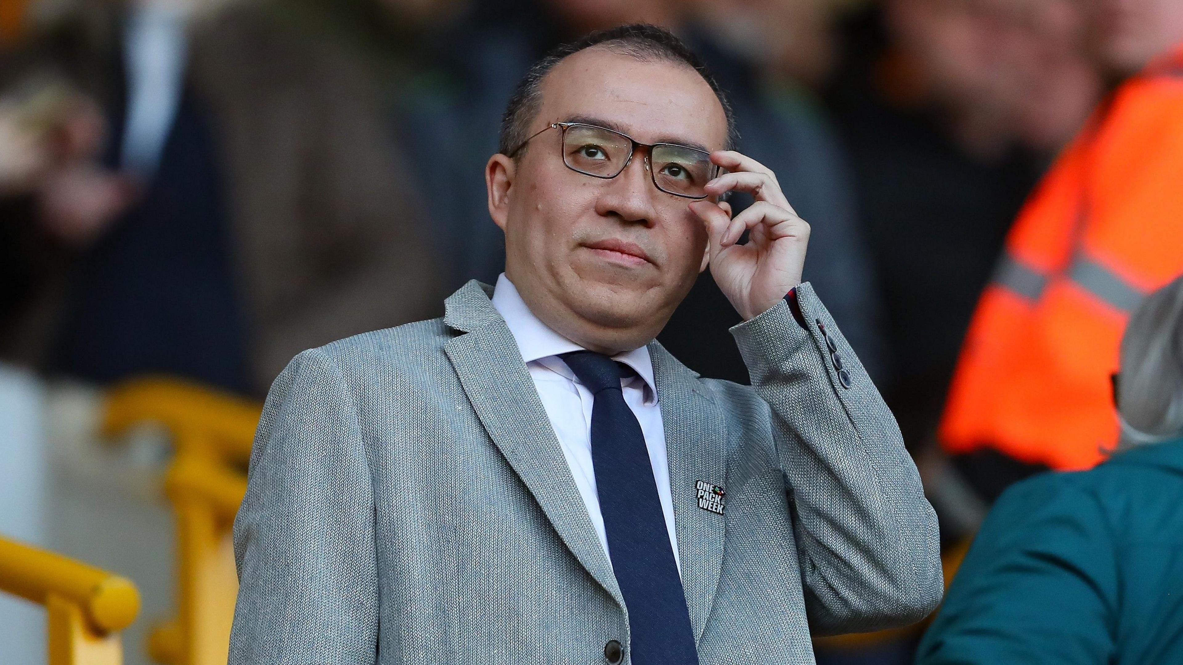 Jeff Shi looks at the pitch from the Molineux stands.