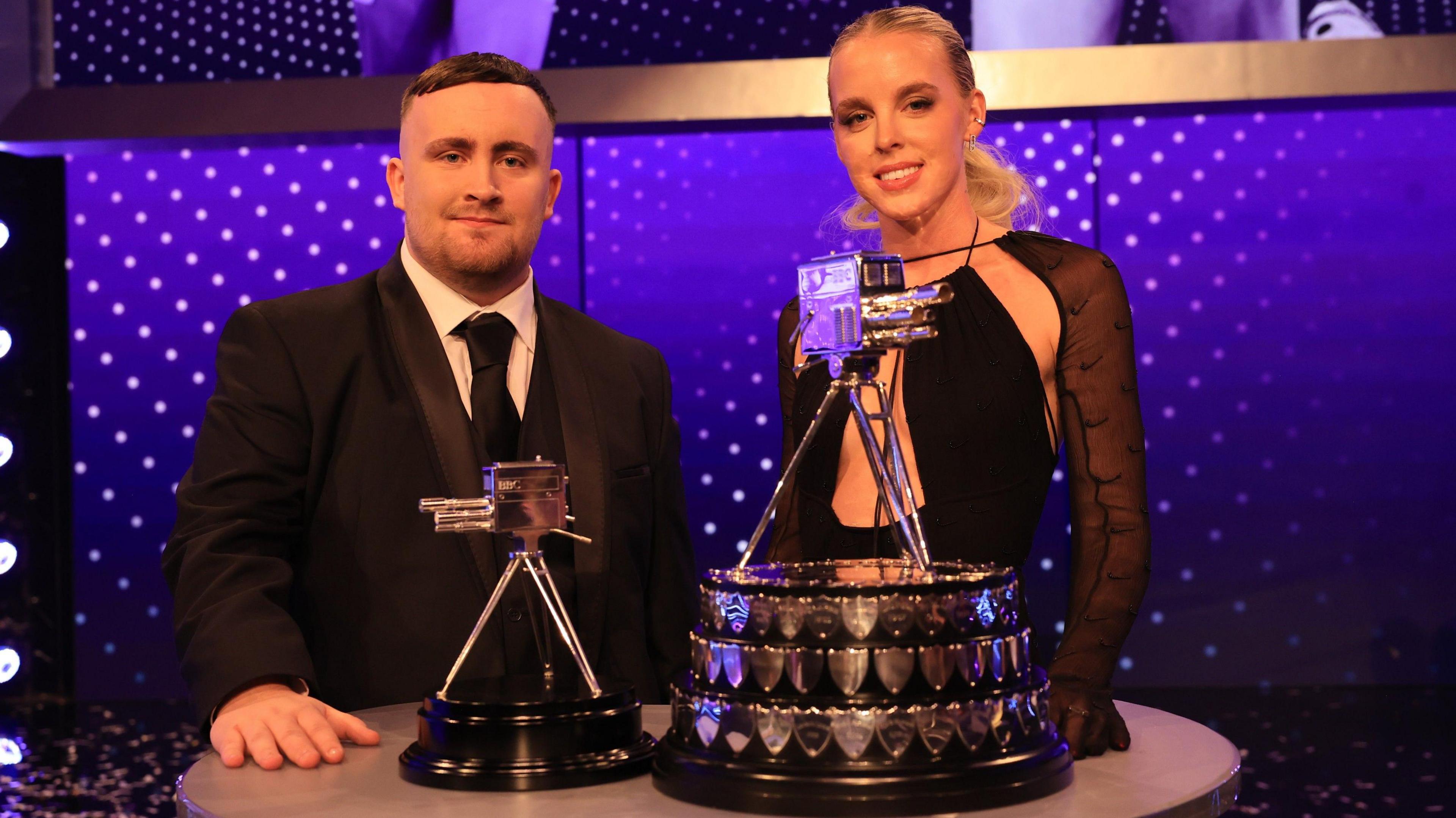Luke Littler (left) and Keely Hodgkinson (right) pose with Sports Personality of the Year trophies