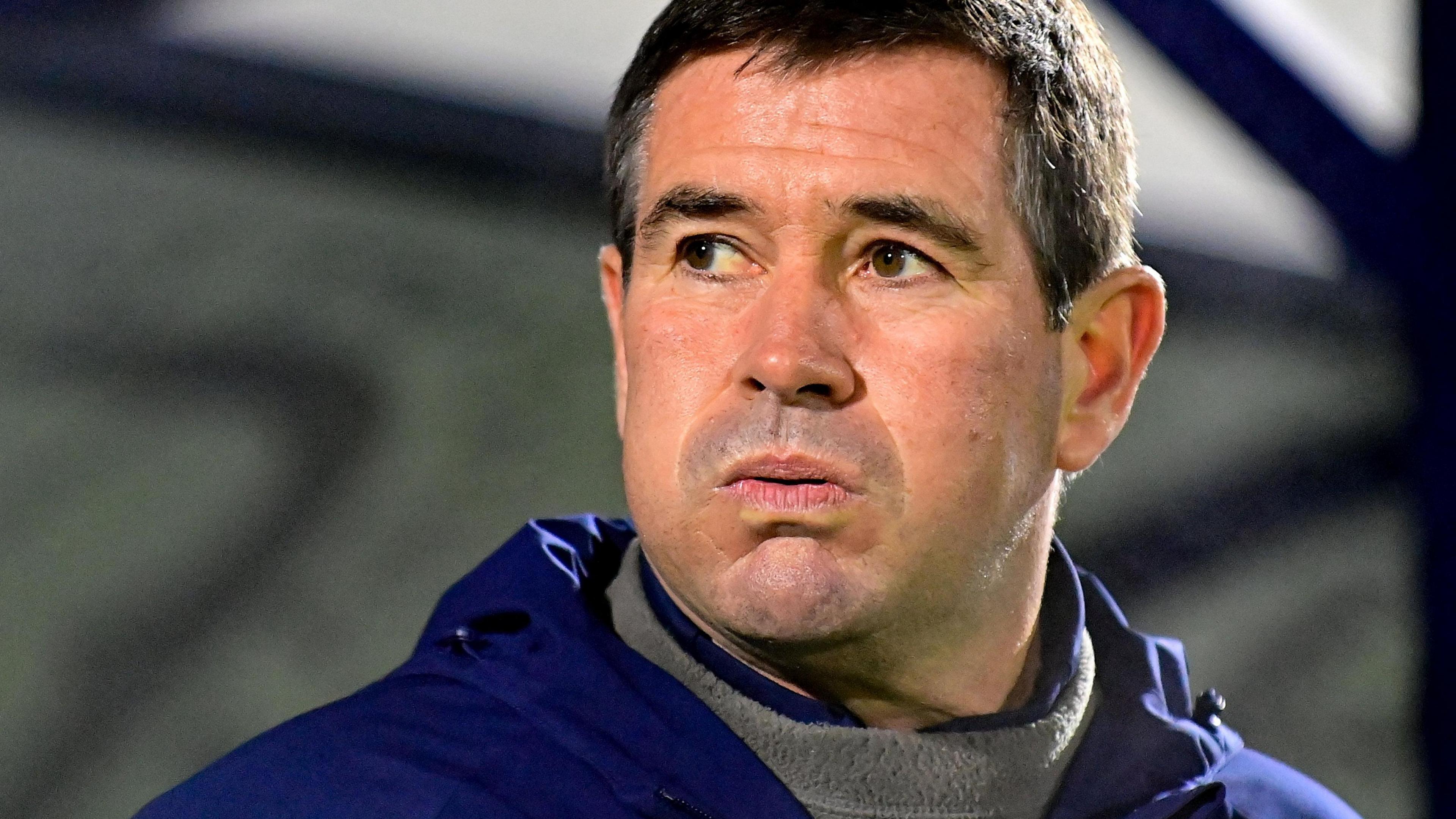 Mansfield Town manager Nigel Clough exhales