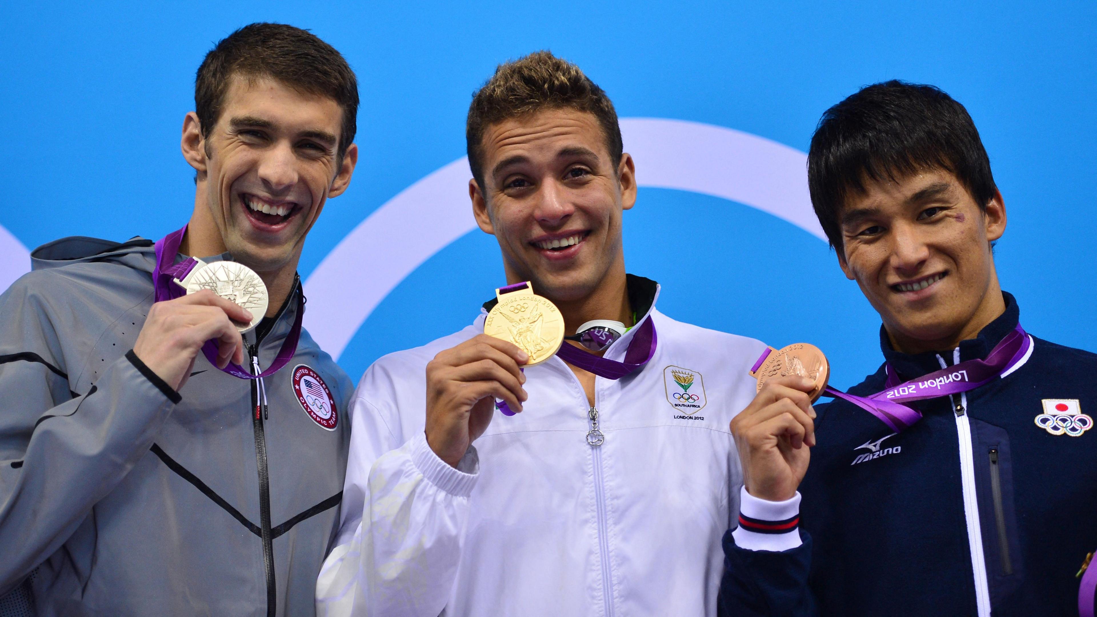 Le Clos poses with his gold medal next to Phleps (left) - who retired after the 2016 Rio Games with a record 23 gold, three silver and two bronze medals. Japan's Takeshi Matsuda (right) took bronze.