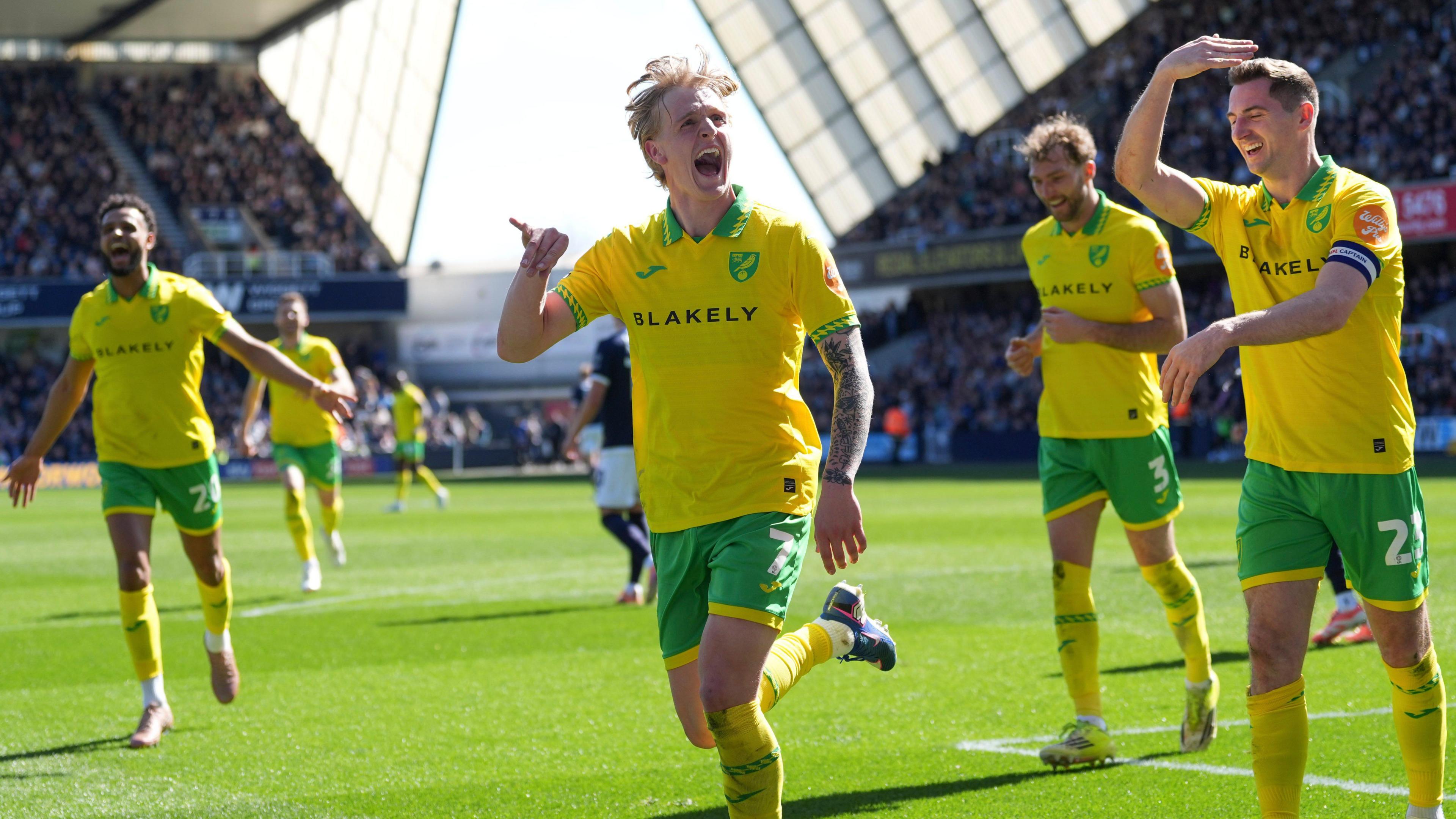 Pelle Mattsson of Norwich City celebrates scoring the equalising goal against Millwall with his team mates