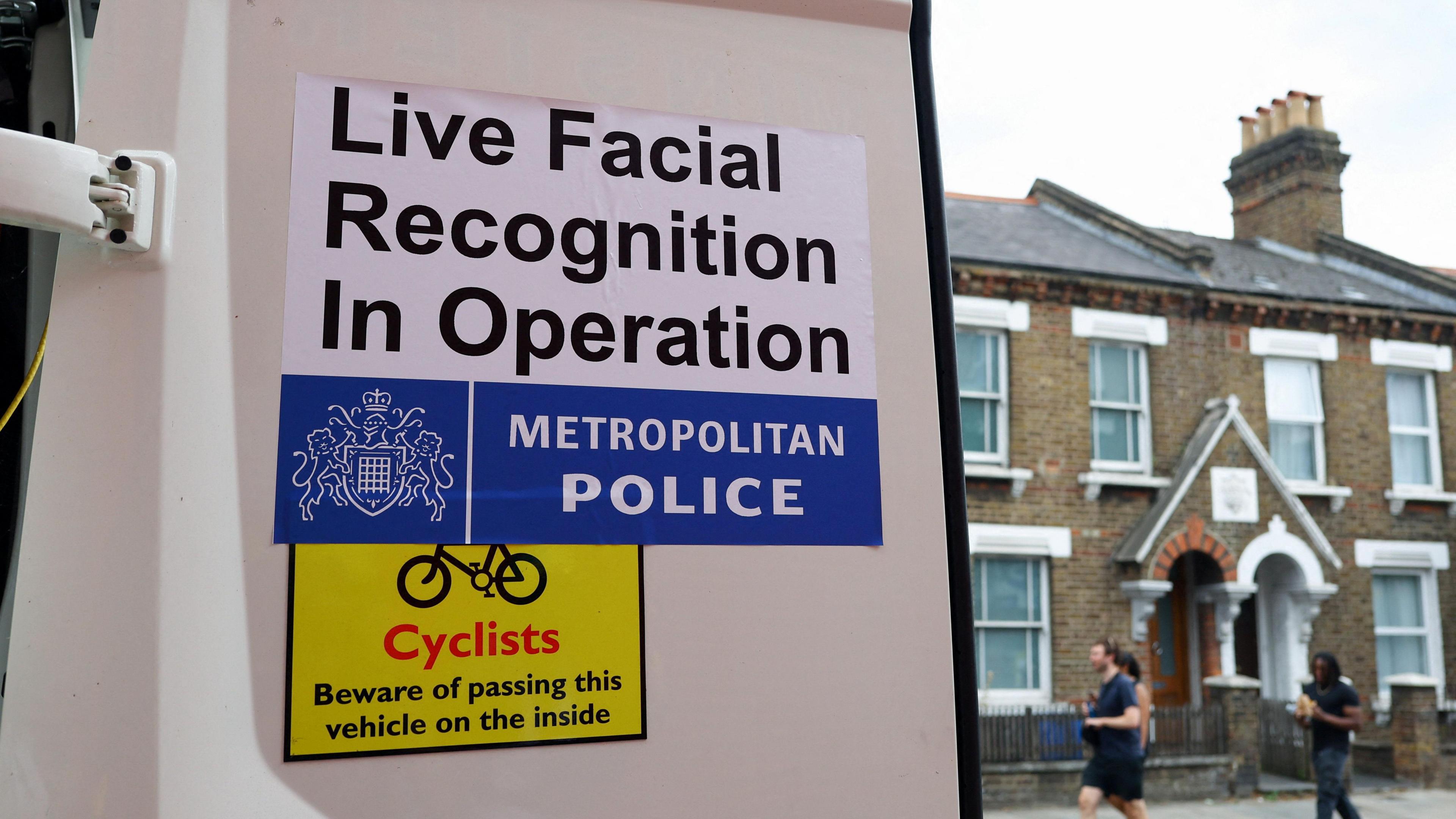 A picture of LFR sign on a police van