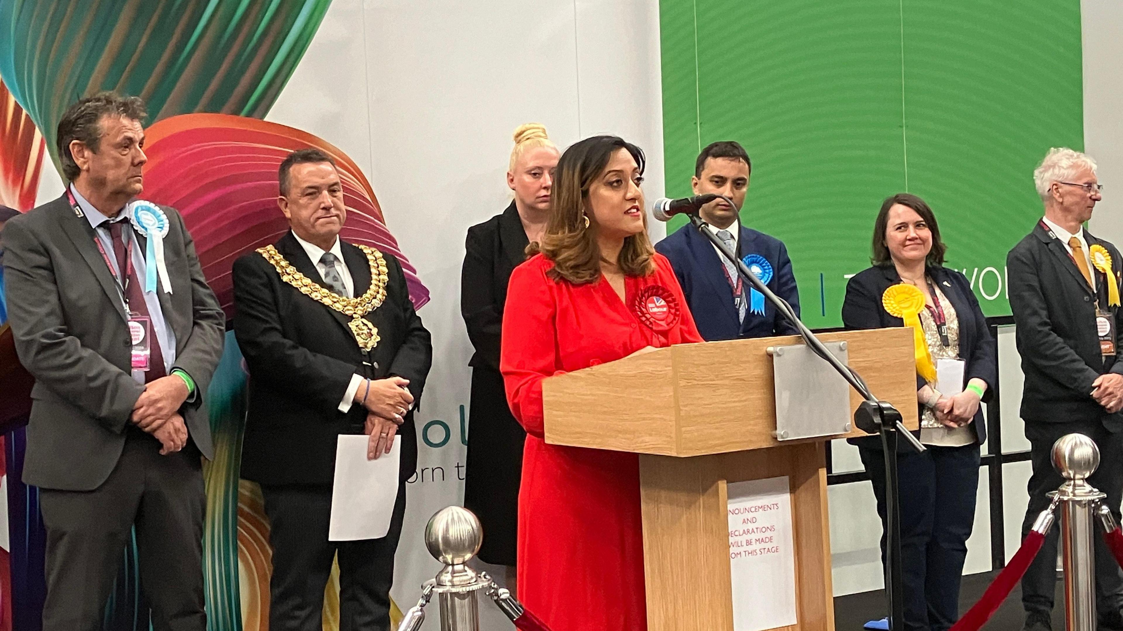 New Bolton North East Labour MP Kirith Entwistle stands on the podium