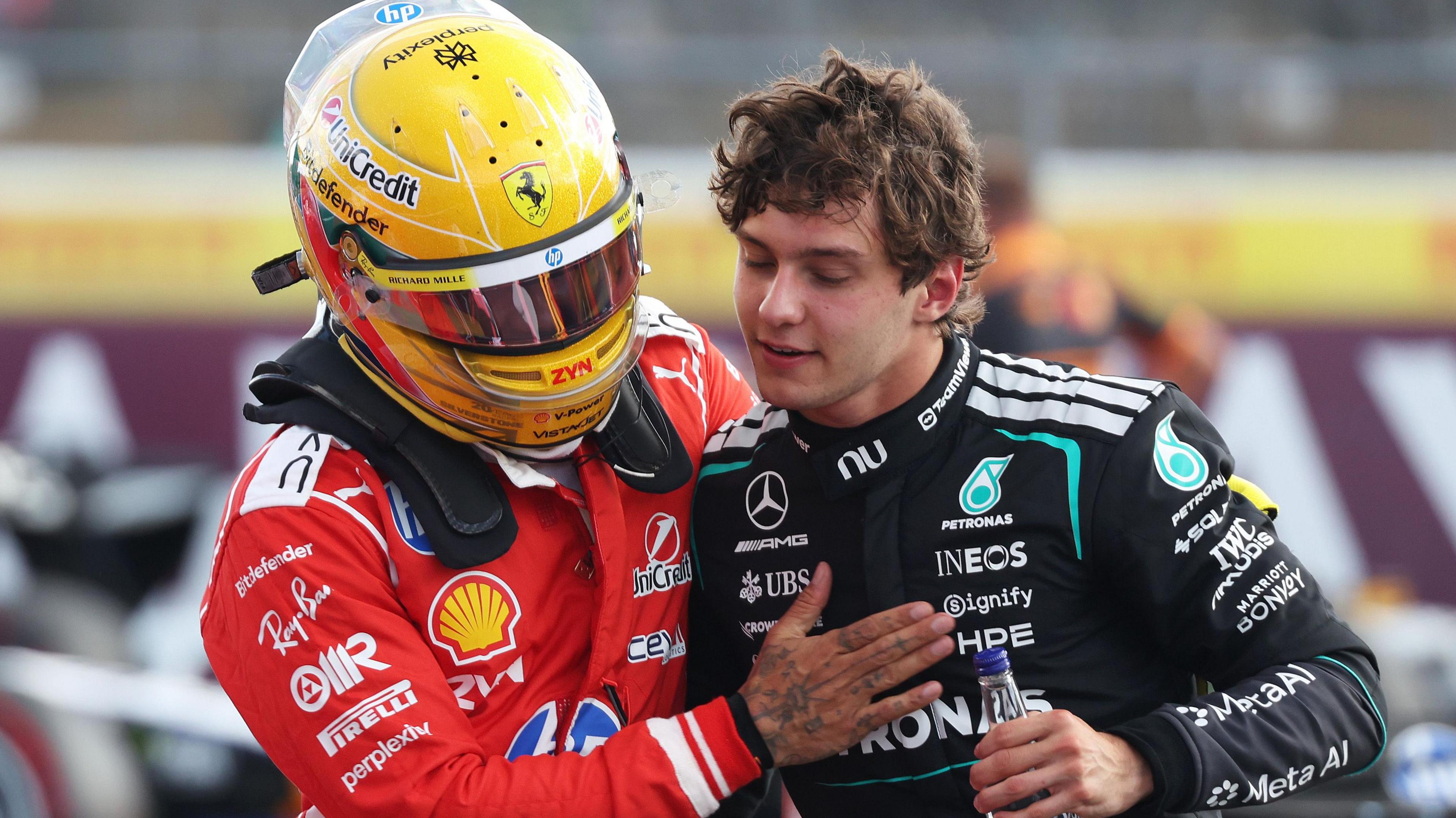 Ferrari's Lewis Hamilton congratulates Kimi Antonelli on his pole position for the British Grand Prix