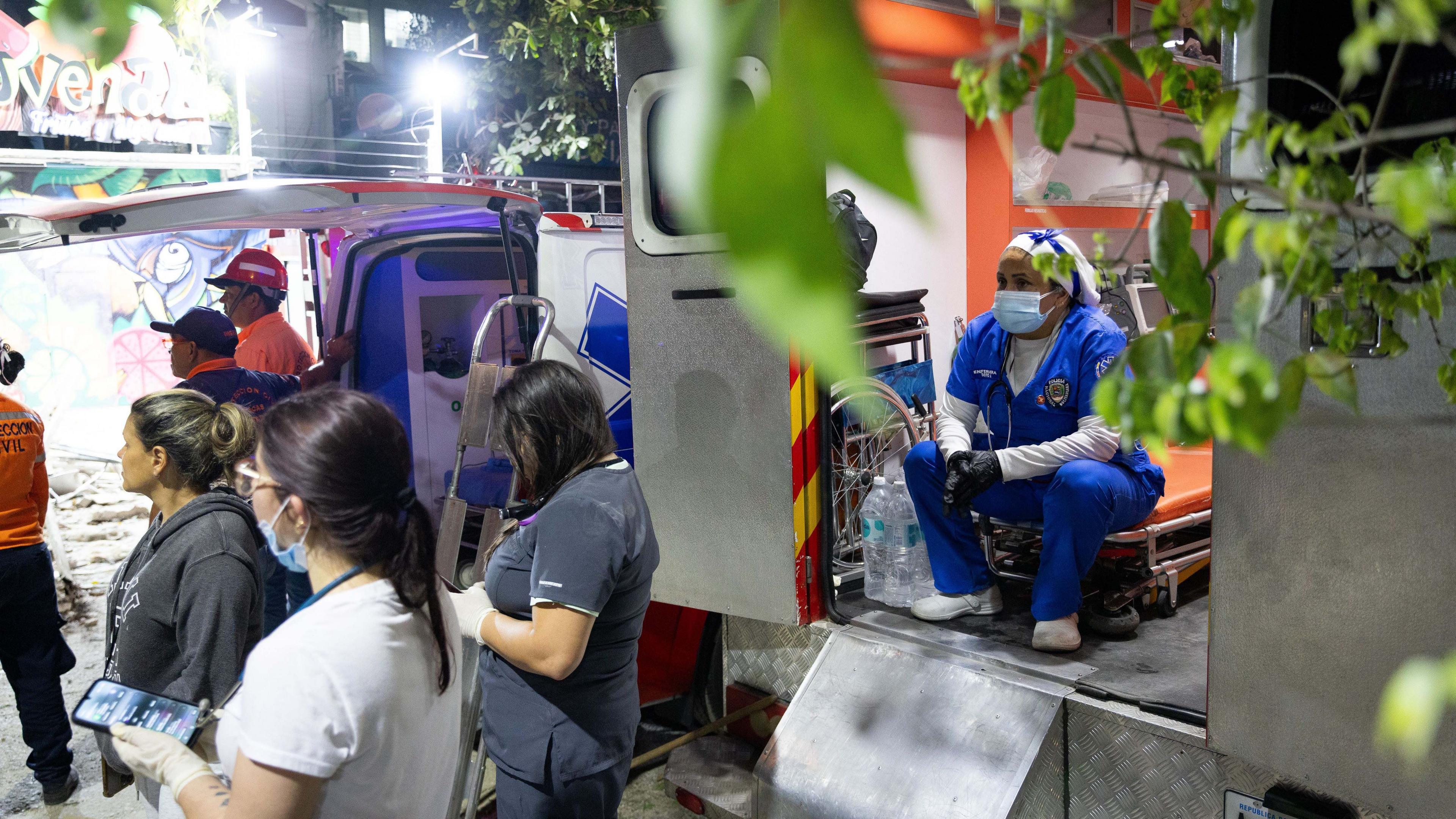 Medical staff wait in Caracas, Venezuela, 