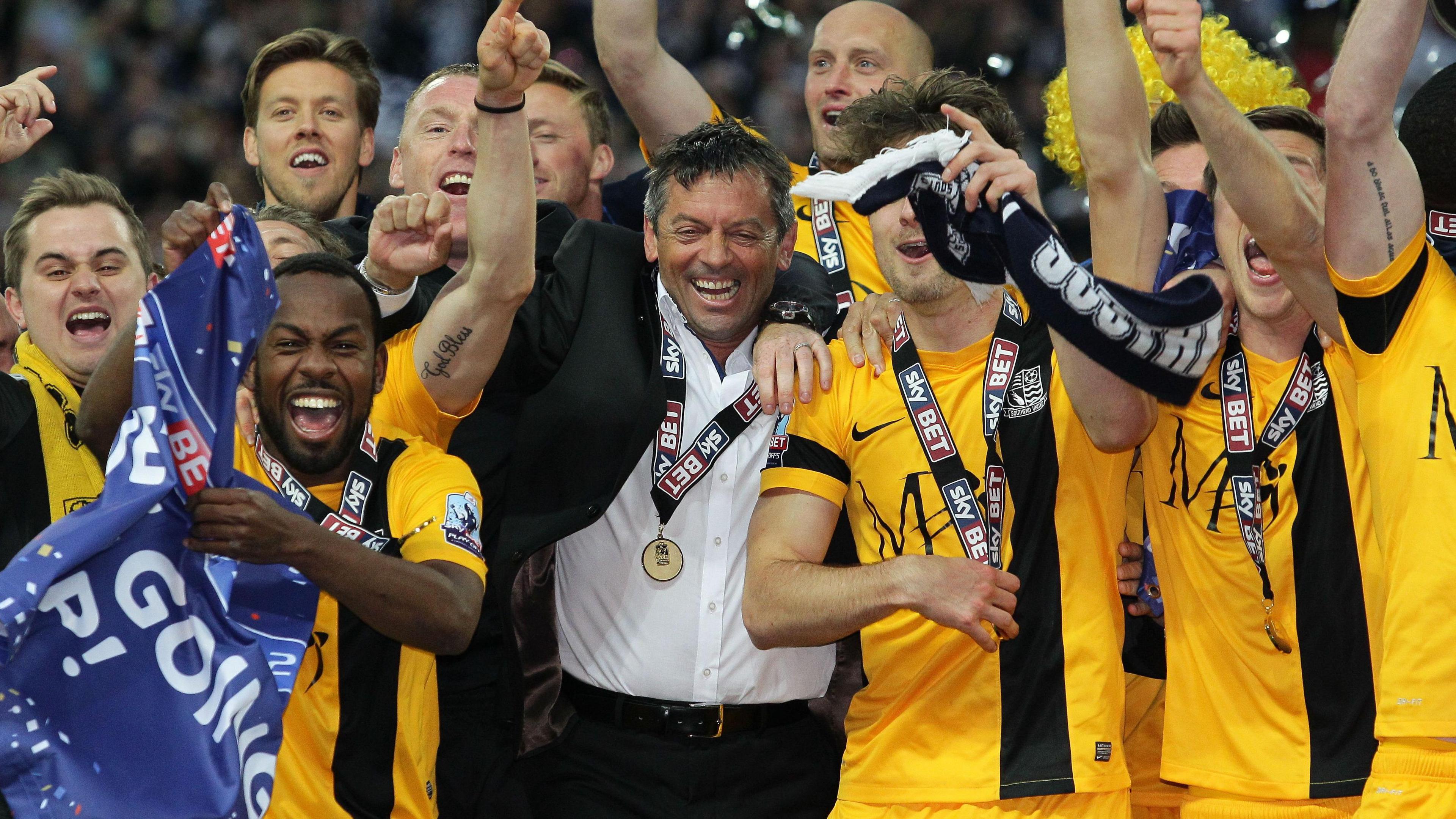 Phil Brown and Southend celebrate after winning the League Two play-off final in 2015