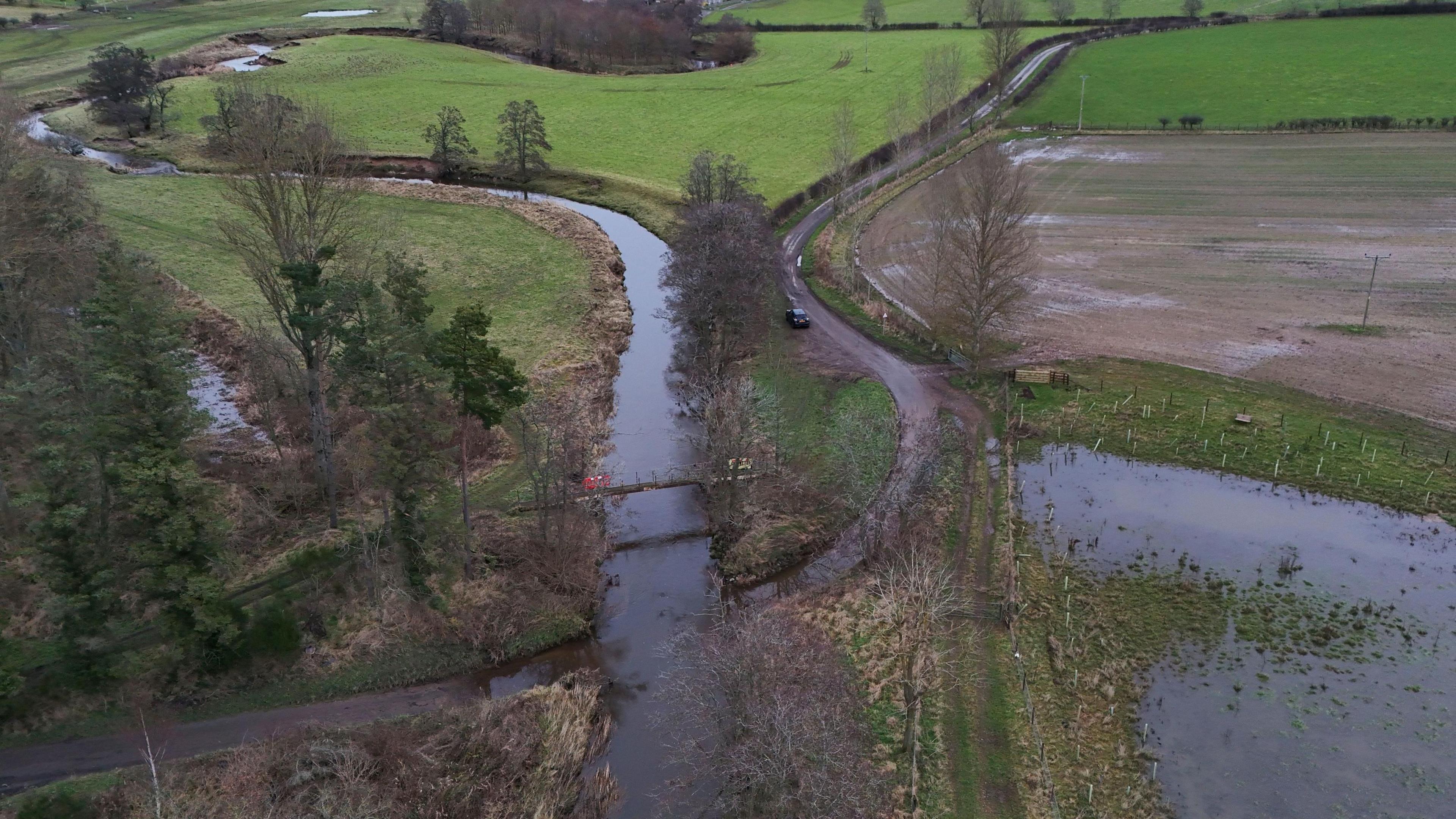 An aerial of the scene showing a river and ford 