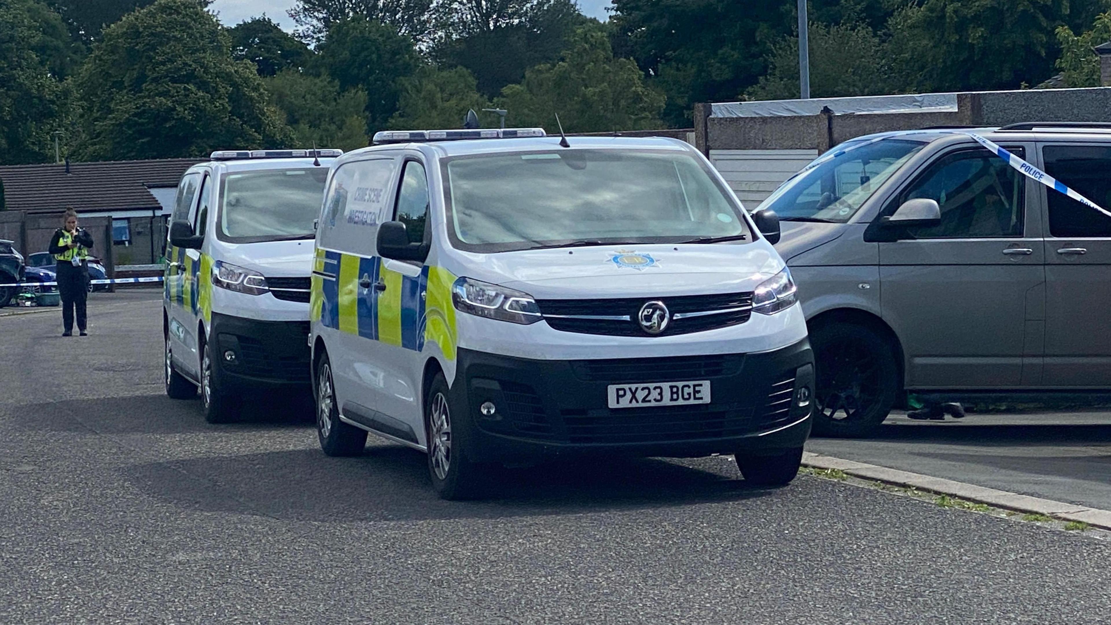 Police cars at the scene at Whernside around the time of the incident