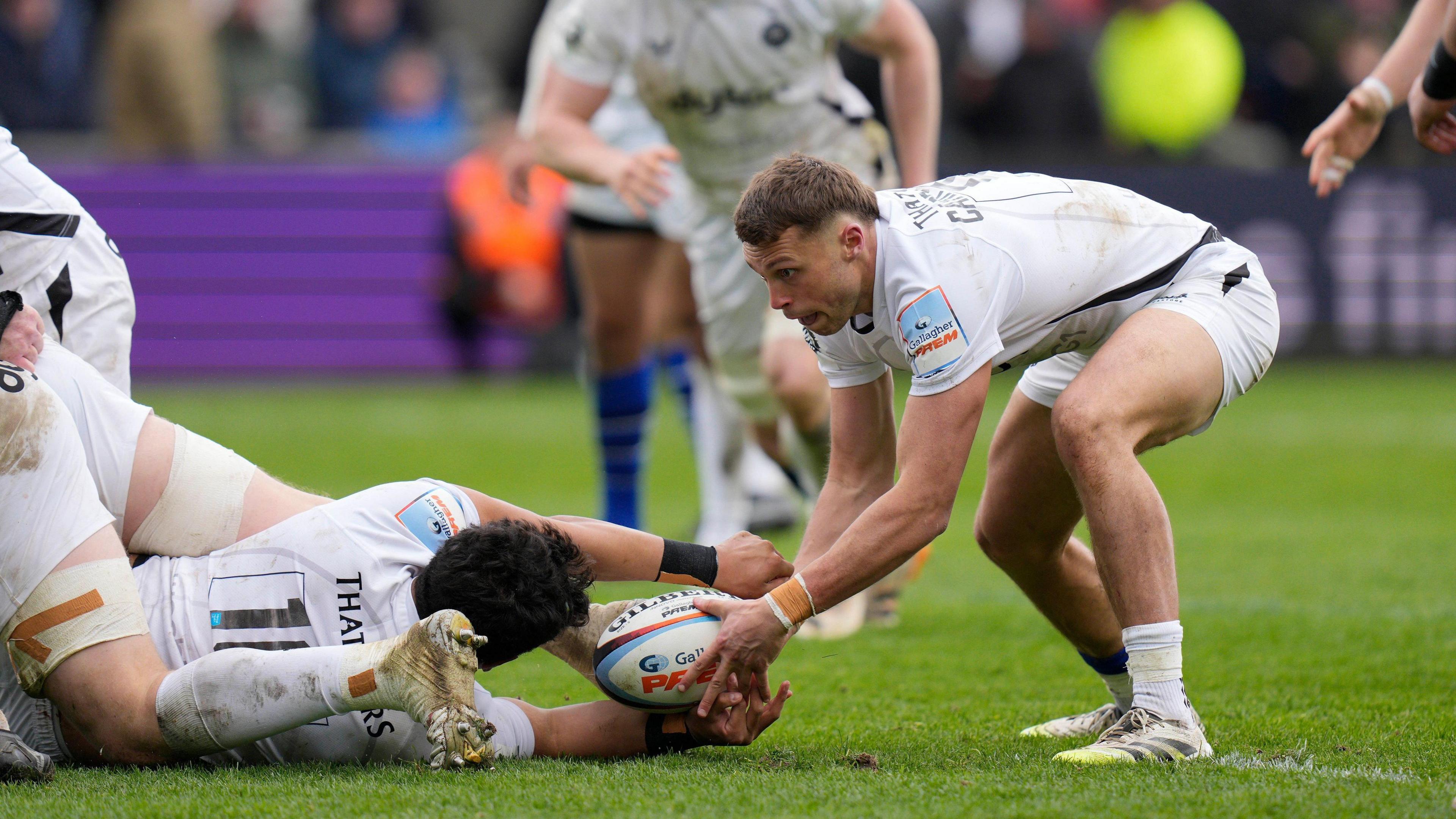 Bath's Tom Carr-Smith picks a ball from the base of a ruck during the Prem Rugby match between Sale Sharks and Bath Rugby