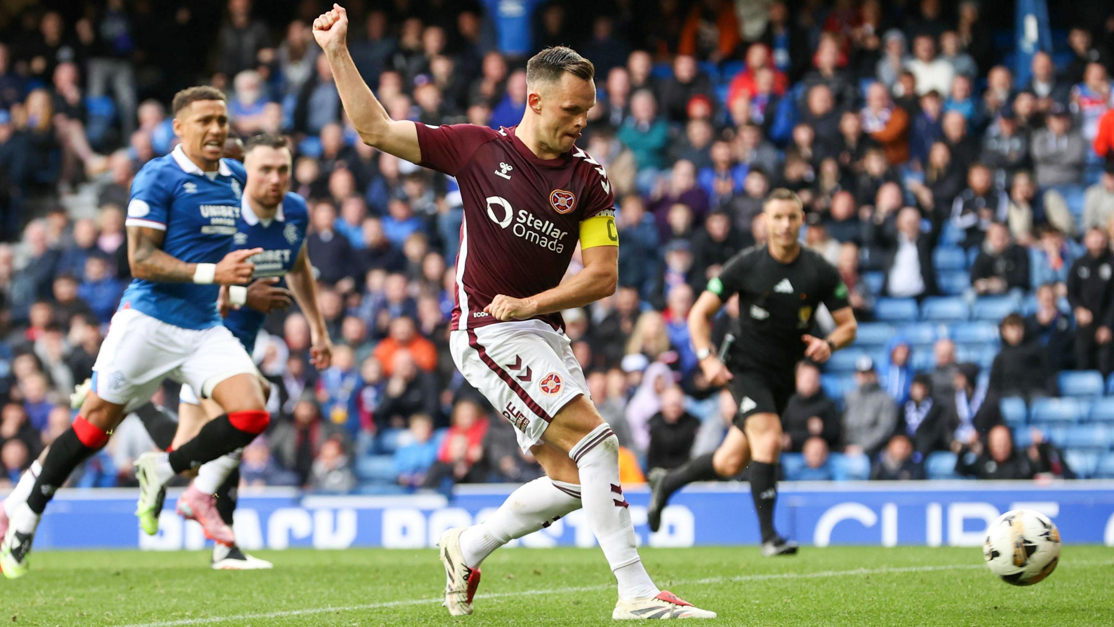 Hearts' Lawrence Shankland scores