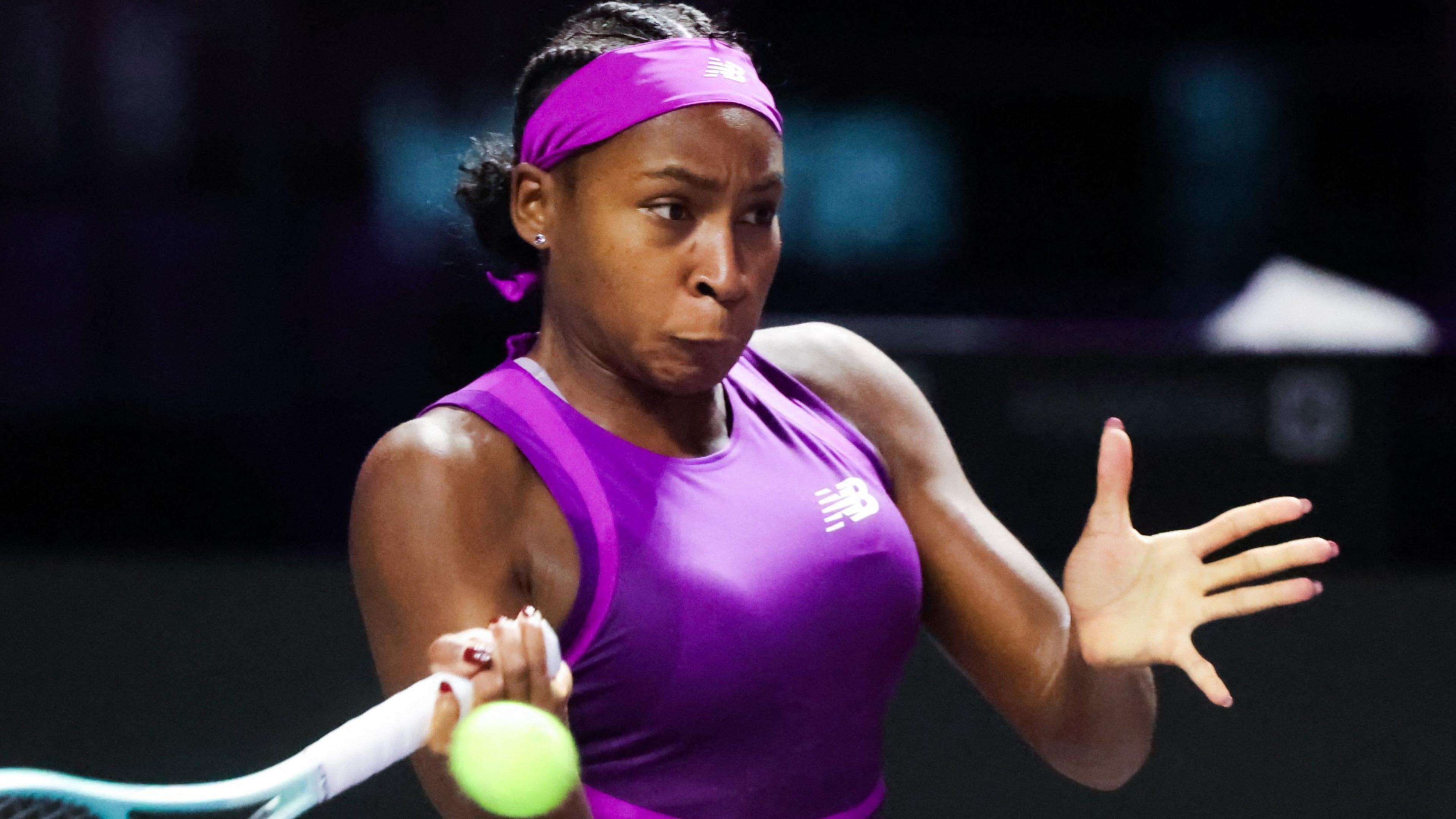 Coco Gauff hits a forehand against Jessica Pegula at the WTA Finals