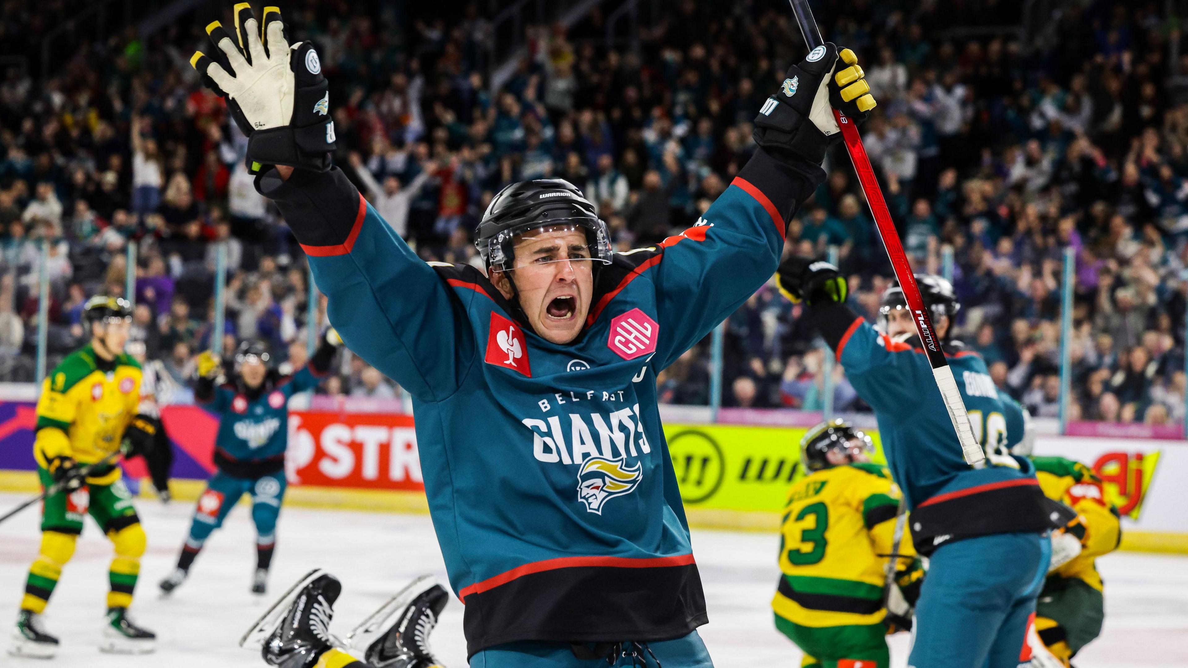 Giants David Goodwin celebrates after scoring one of his two goals