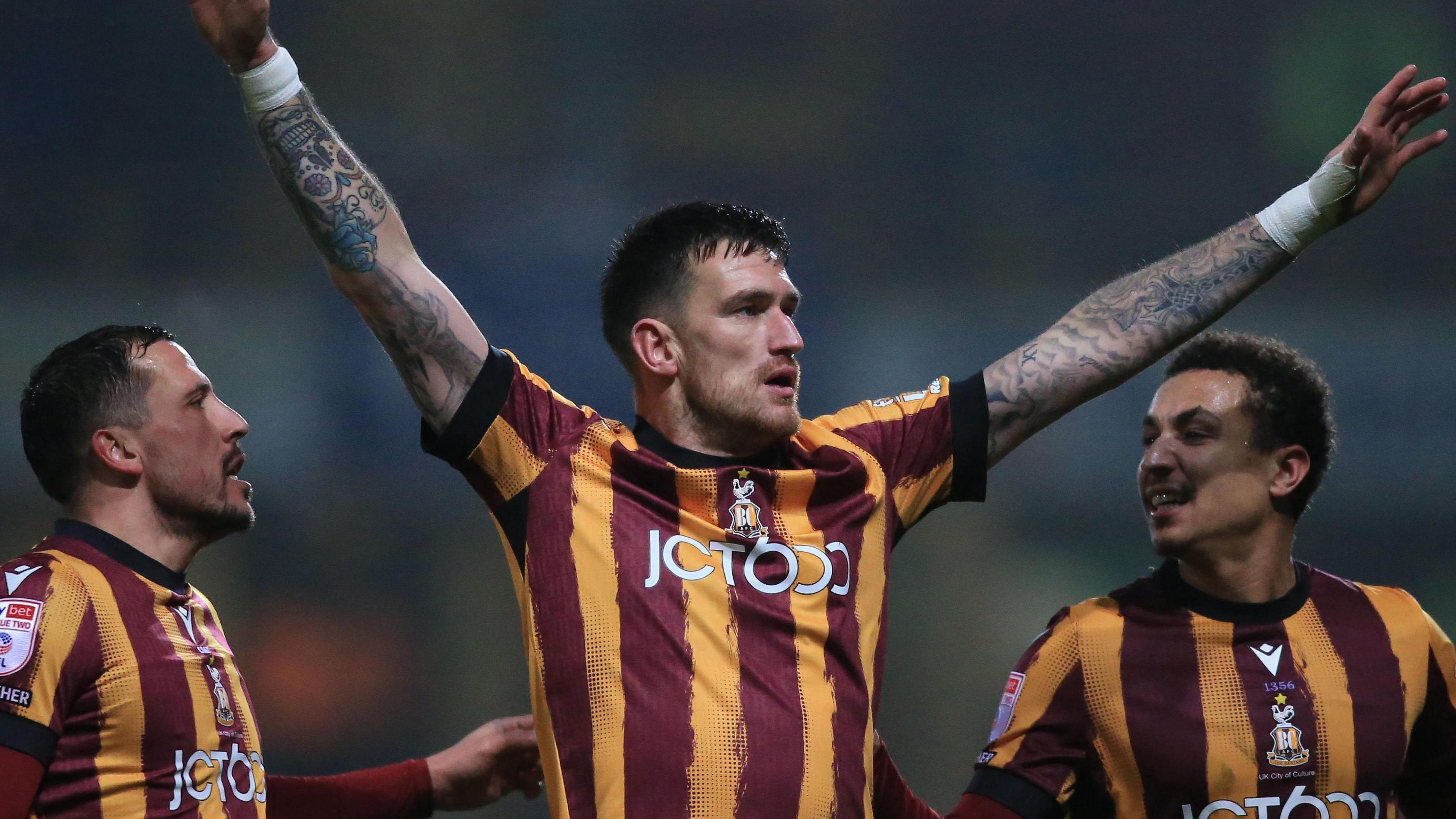 Andy Cook celebrates scoring for Bradford City