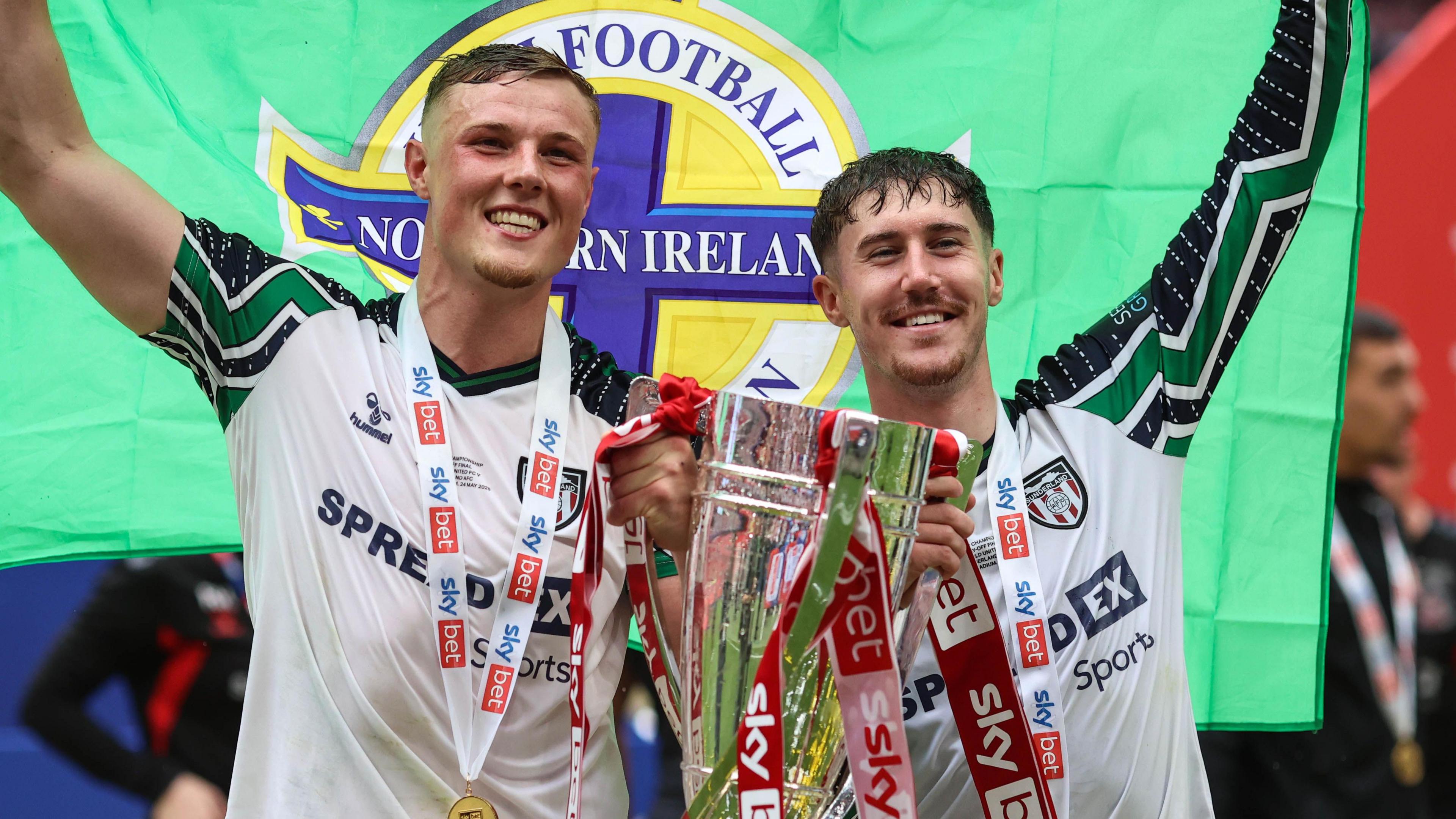 Daniel Ballard and Trai Hume celebrate winning promotion to the Premier League