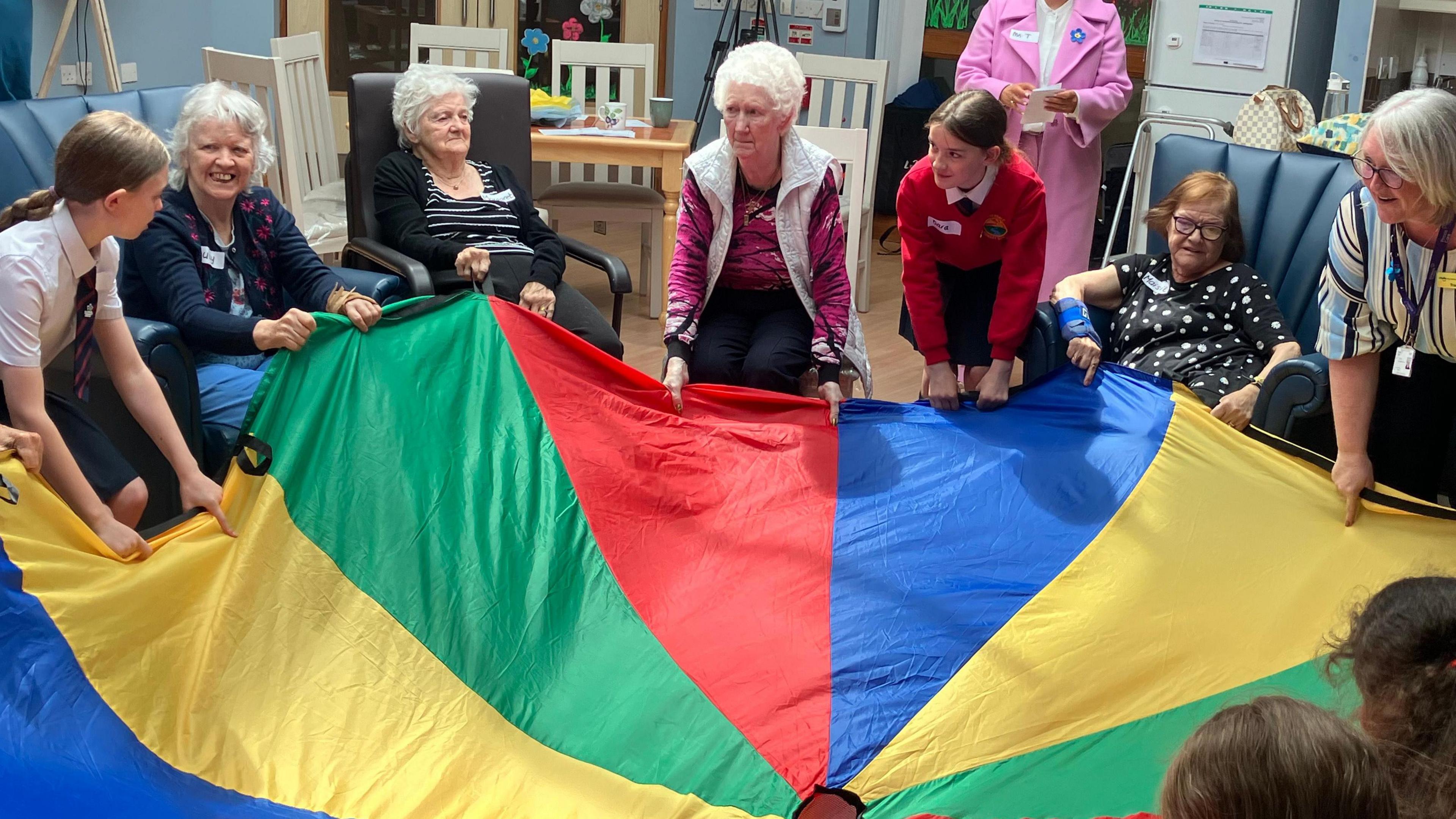 Children and the residents playing games