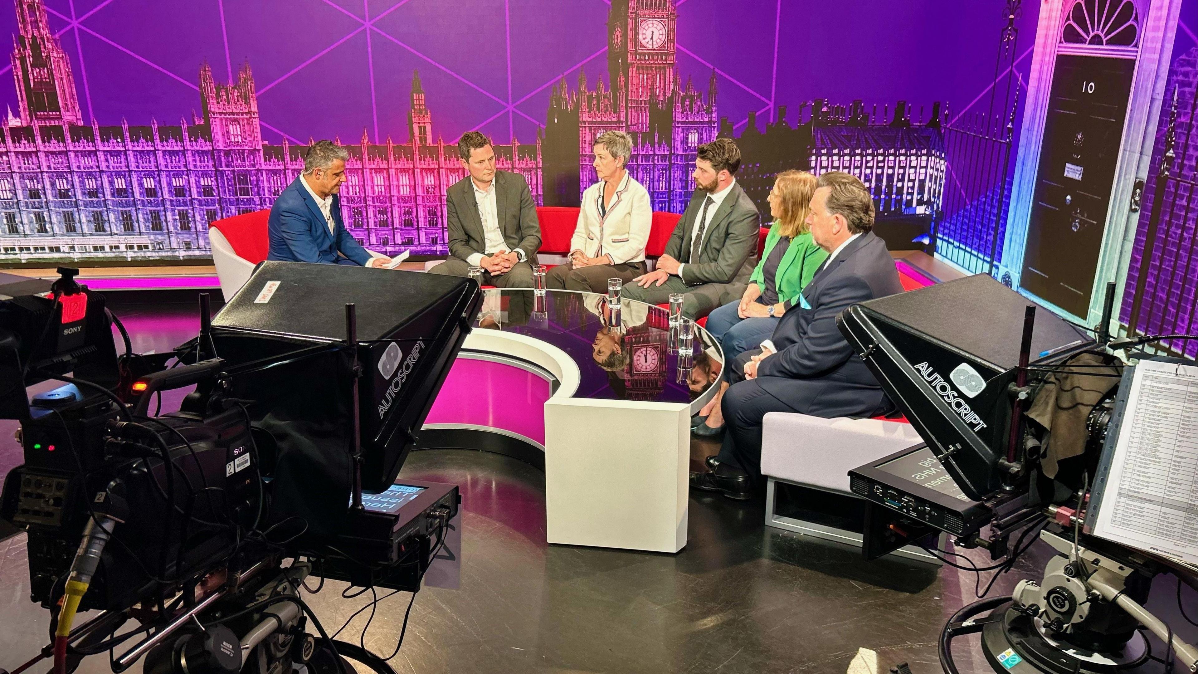 Election candidates in a studio