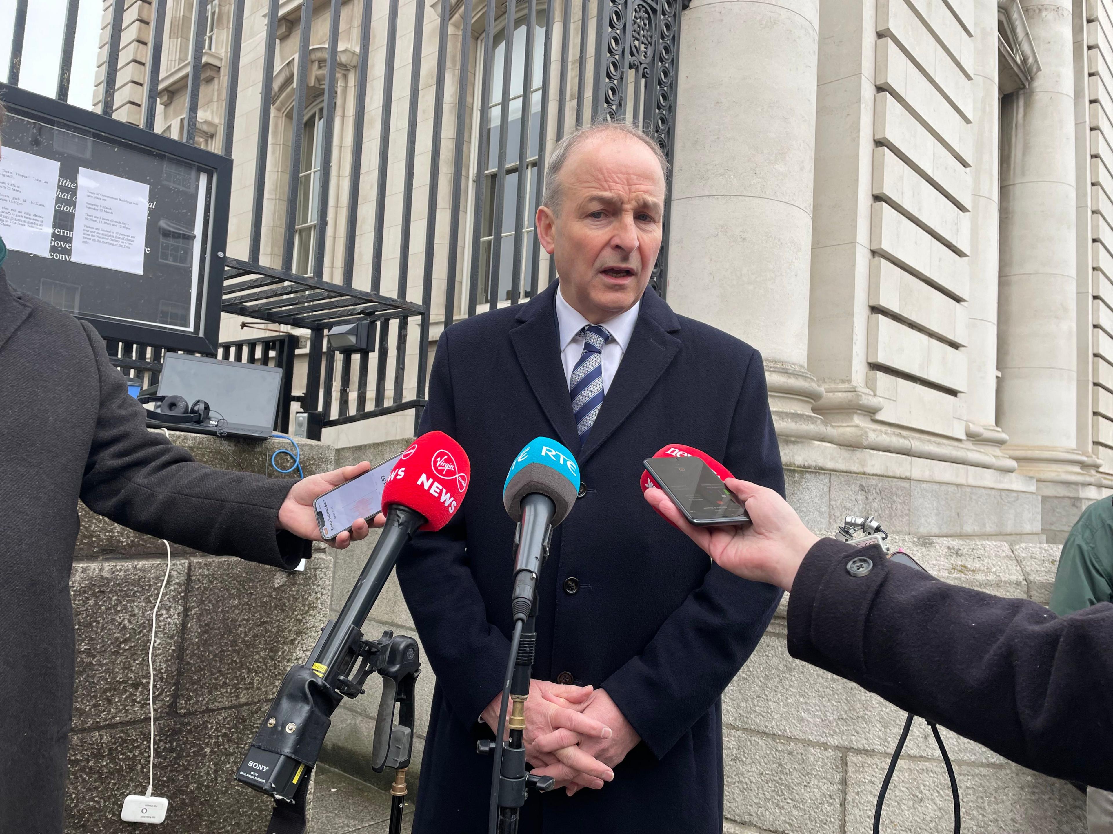 Micheál Martin speaks to the press outside Government Buildings in Dublin