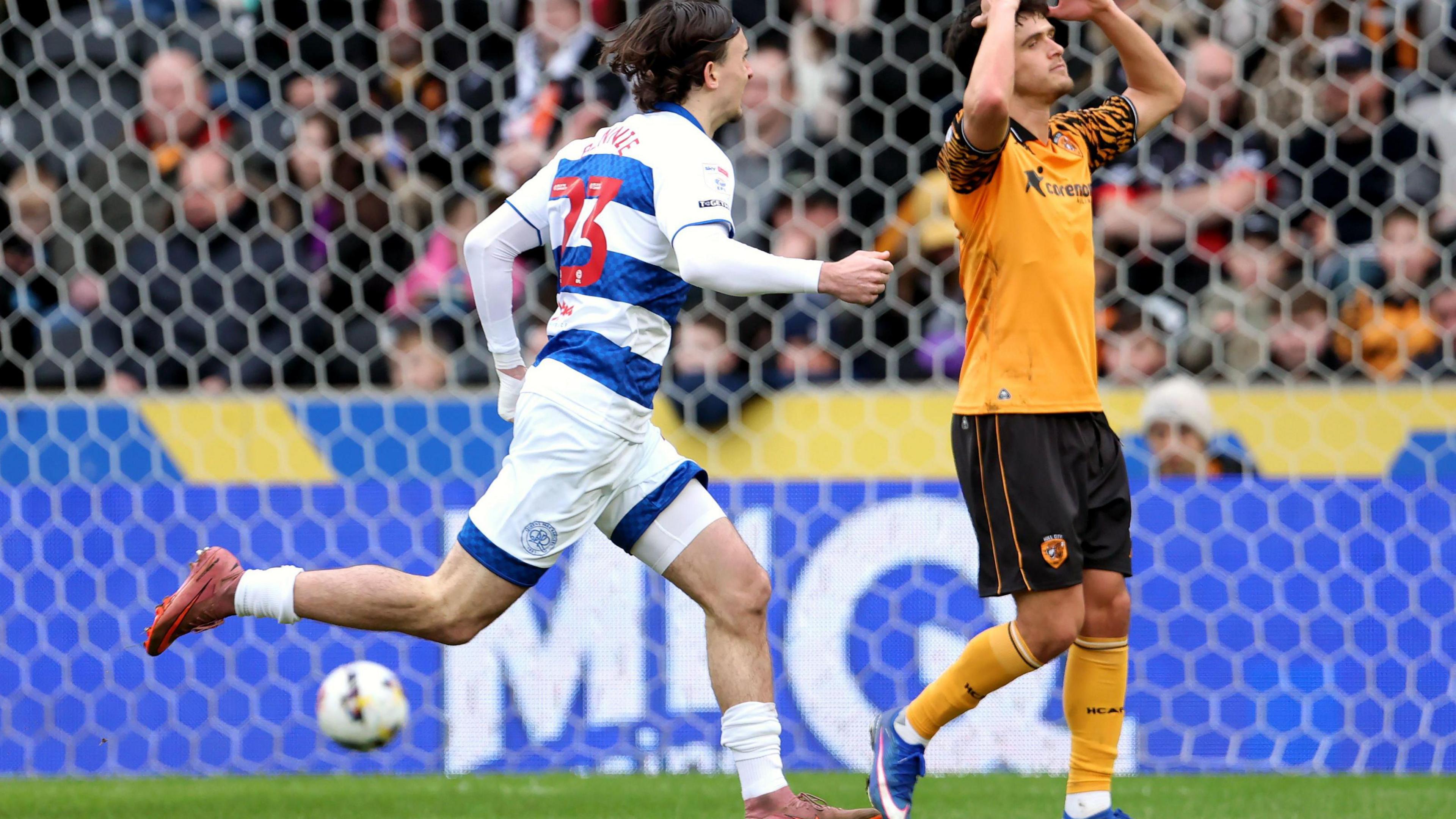 Daniel Bennie runs away from goal after scoring, while a Hull City player puts his hands up to his head